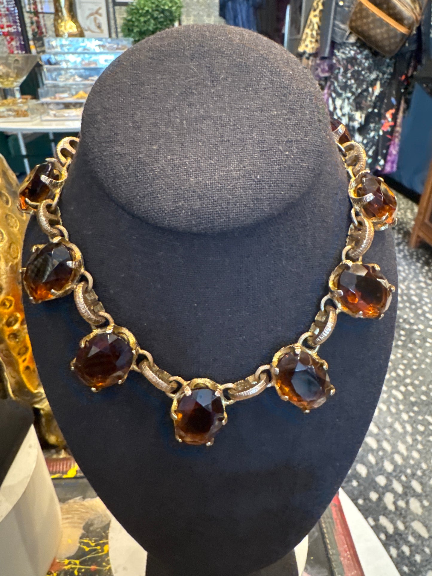 stunning 1940s amber colored Austrian Christal necklace with heavy gold washed brass and open back settings