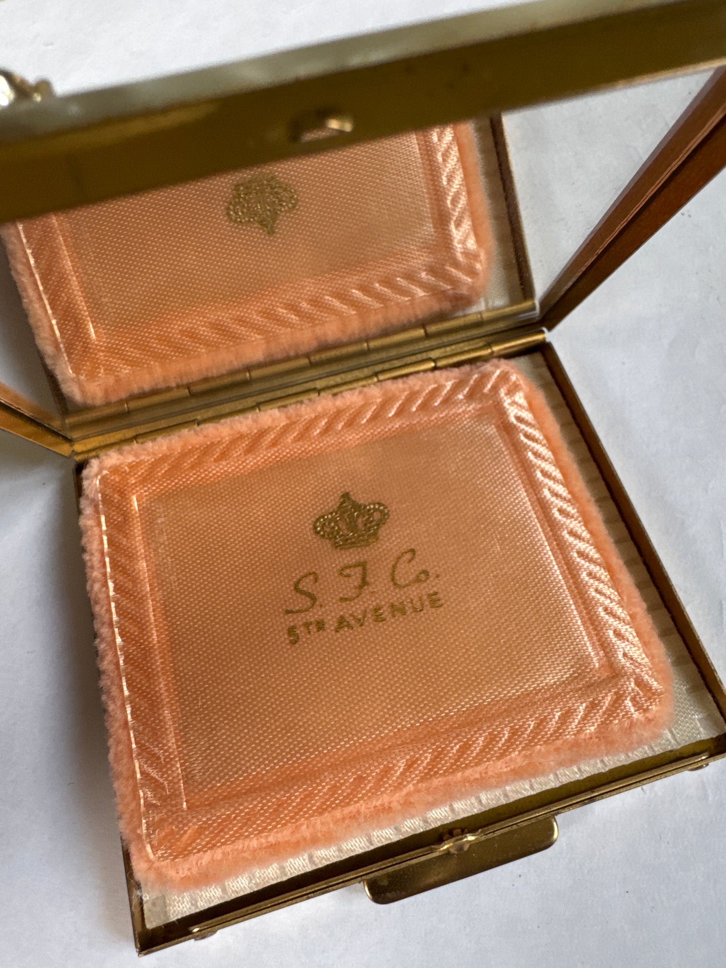 Beautiful 1940s mother-of-pearl Makeup compact with gold tone, leaf design aurora borealis stones and pearls signed S.F. Co 5th Avenue