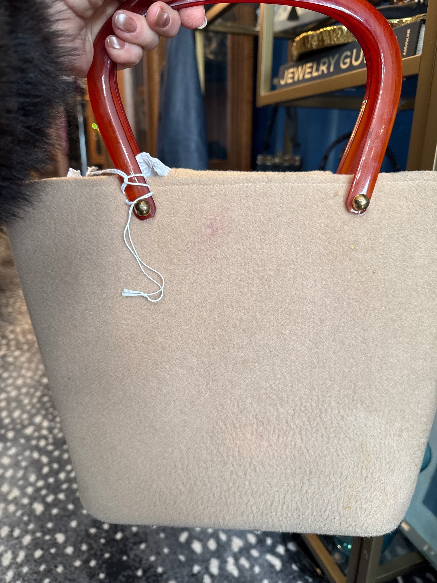 1950s beige felt top handle handbag with lucite handles. see photos.