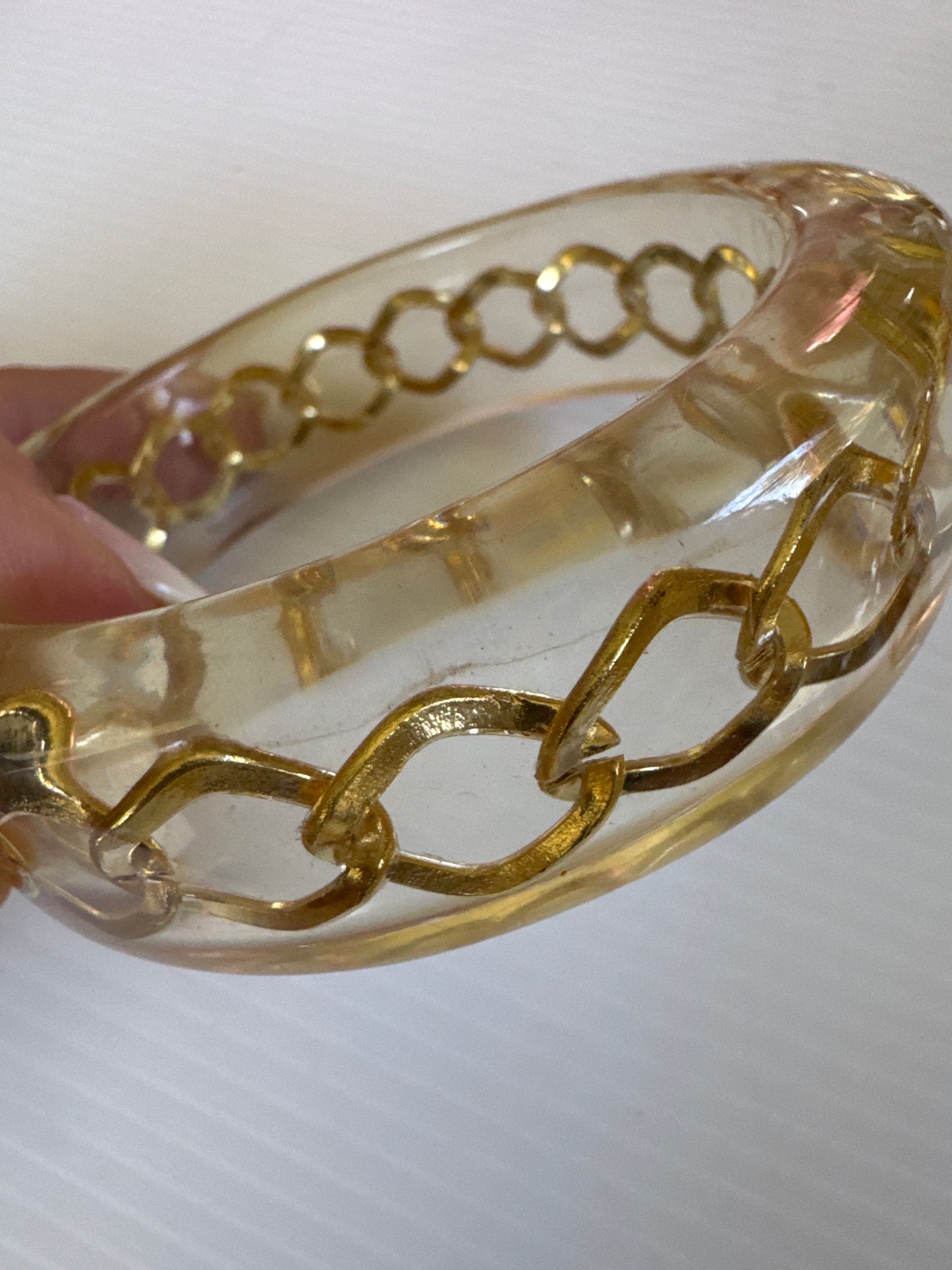 1990s resin bracelet with gold link chain inside