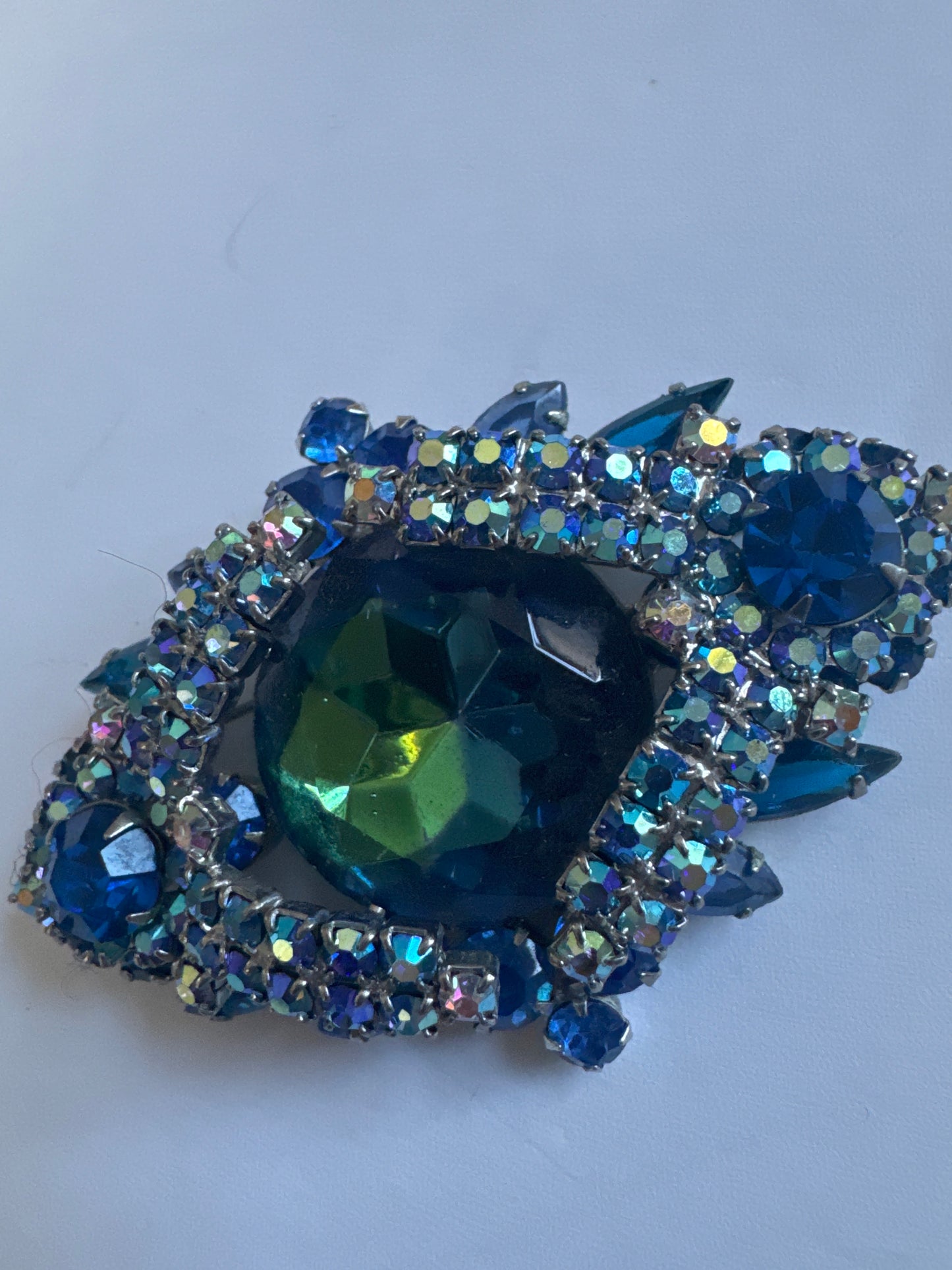Gorgeous 1960s Juliana Montana blue rhinestone brooch with blue watermelon center stone. Photo doesn't do this piece justice!