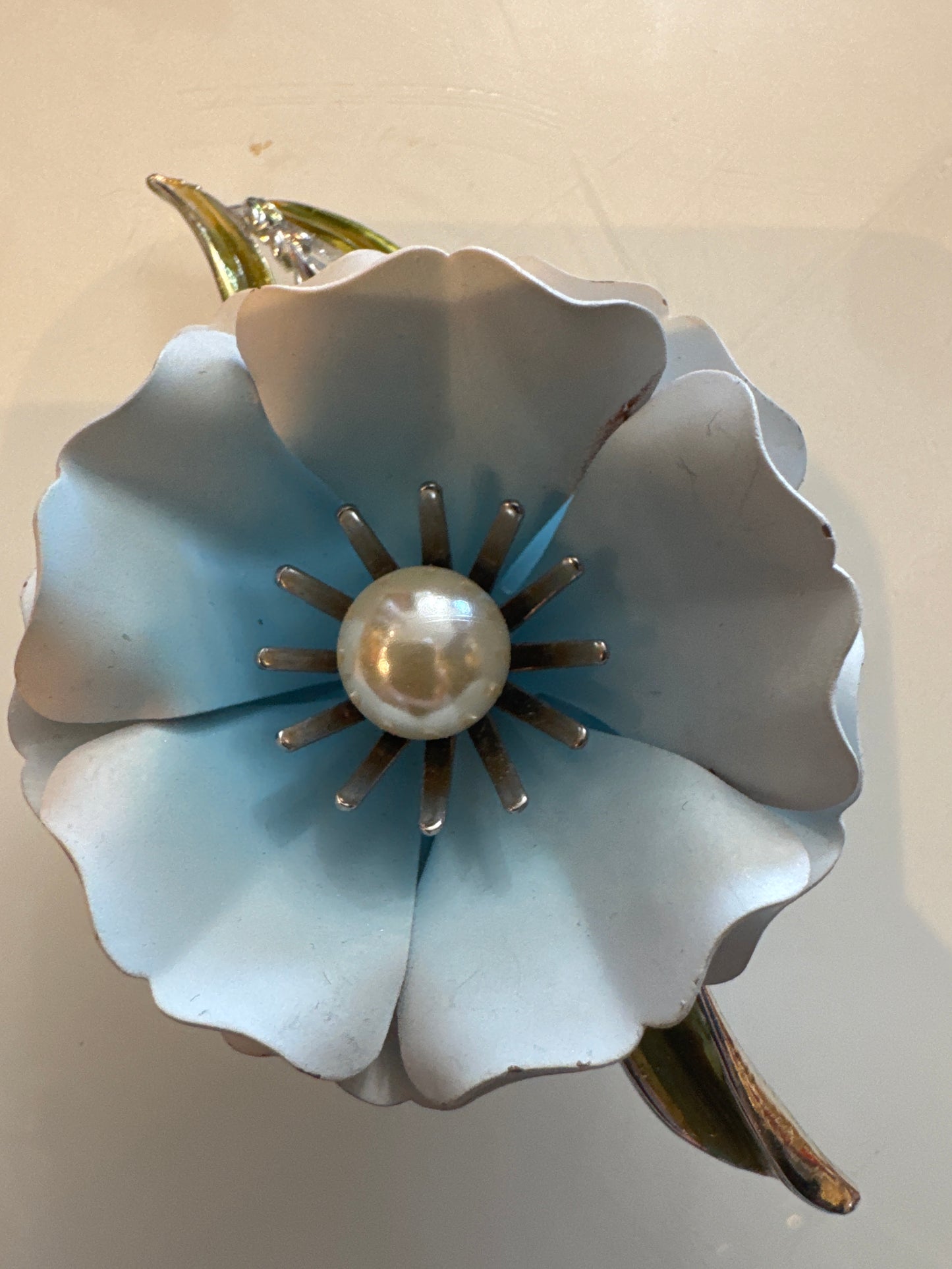 1960s light blue flower brooch with pearl center stone
