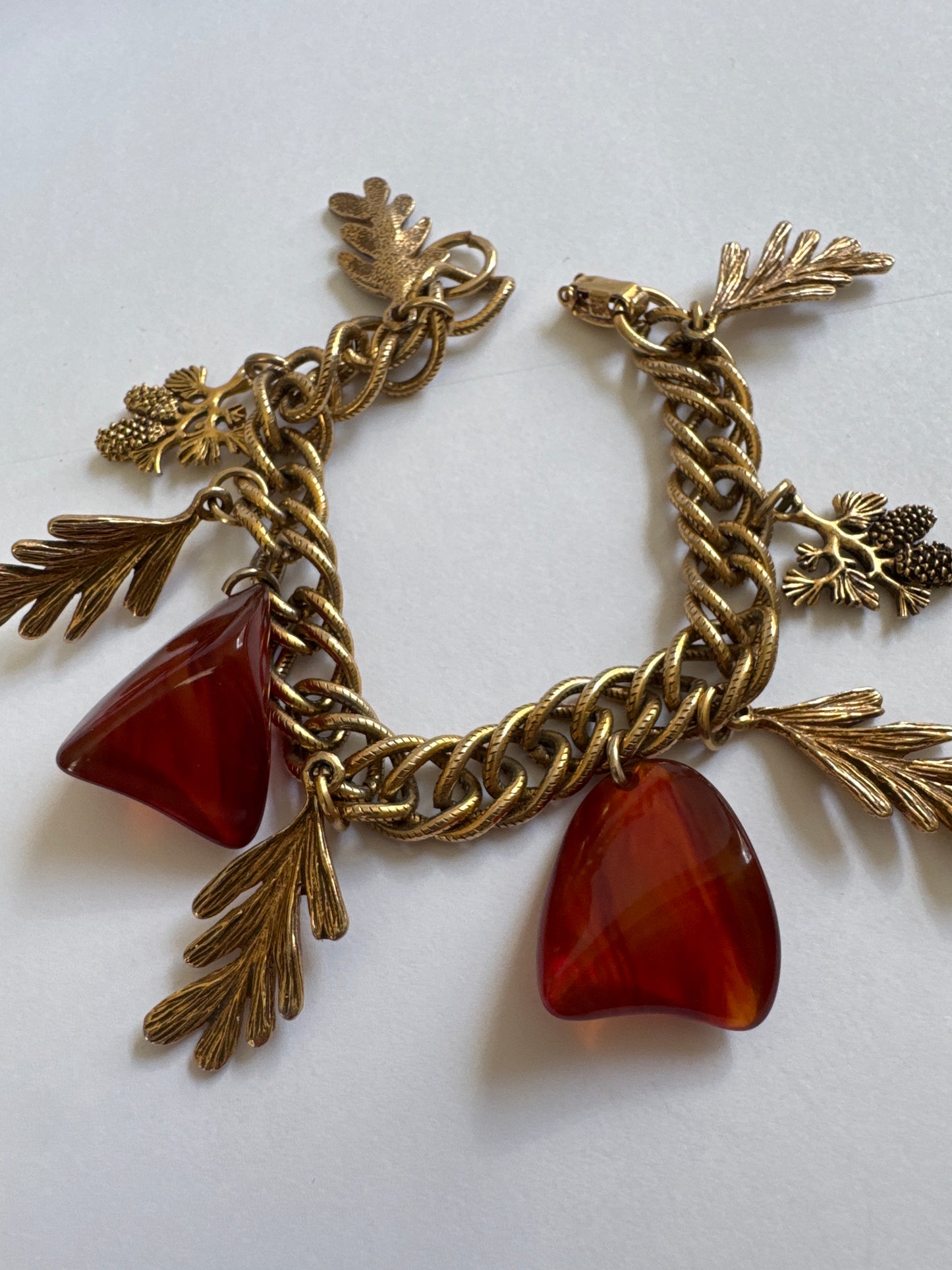 1970s tortoise resin shapes with pinecones and leaves on a charm bracelet