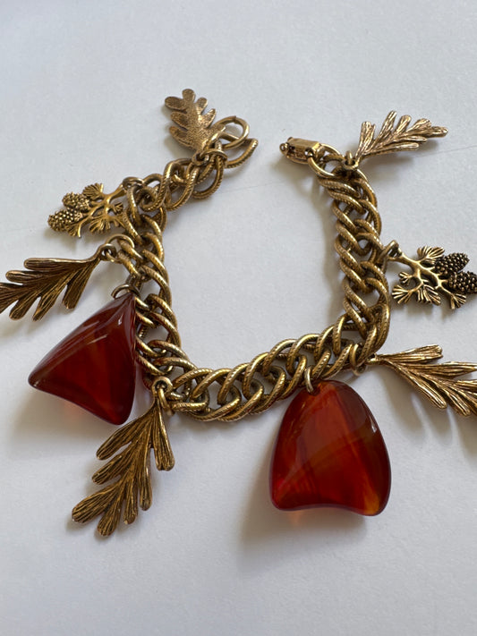 1970s tortoise resin shapes with pinecones and leaves on a charm bracelet