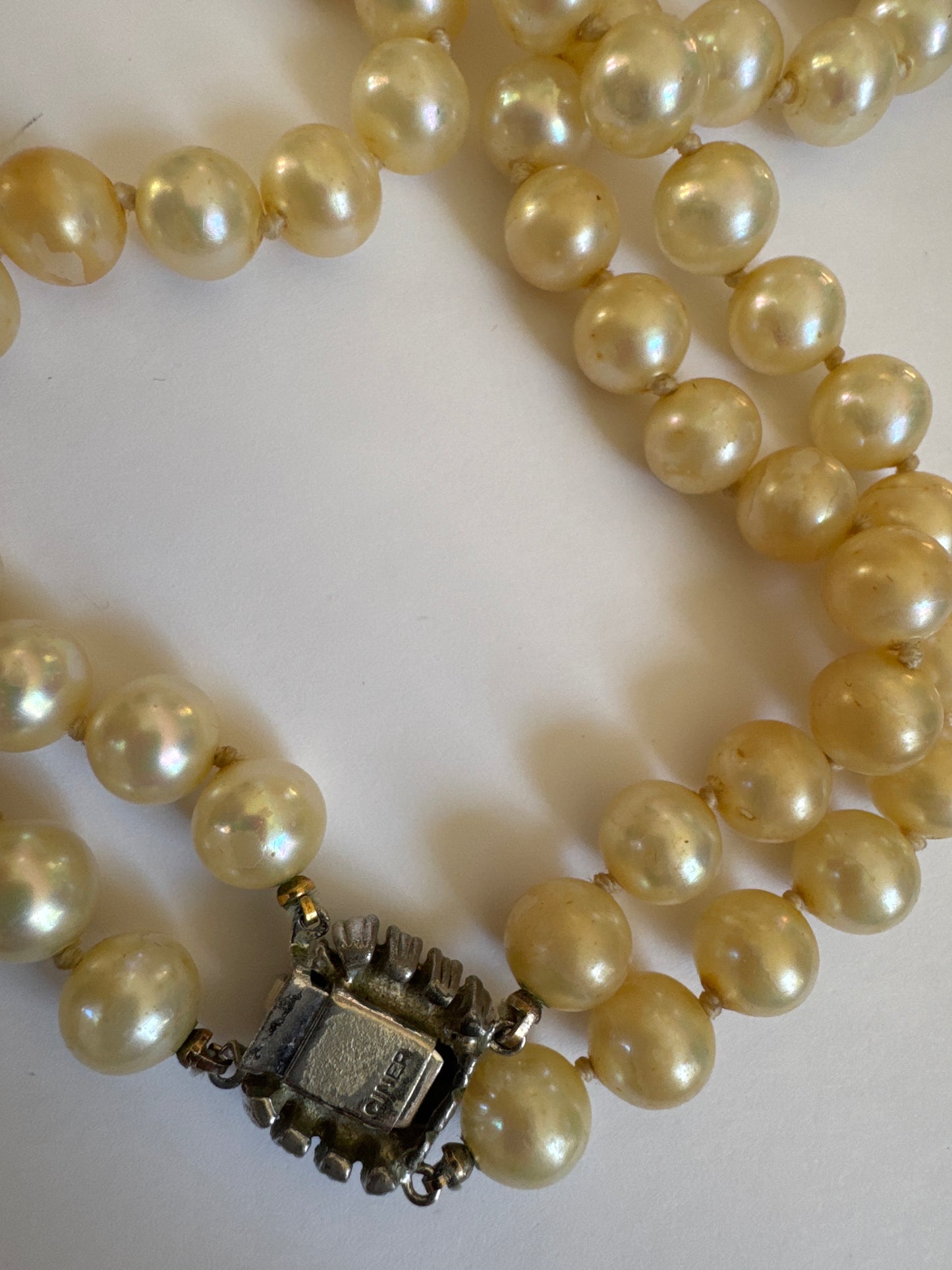 Gorgeous vintage double strand pearl necklace by CINER with emerald and rhinestone clasp