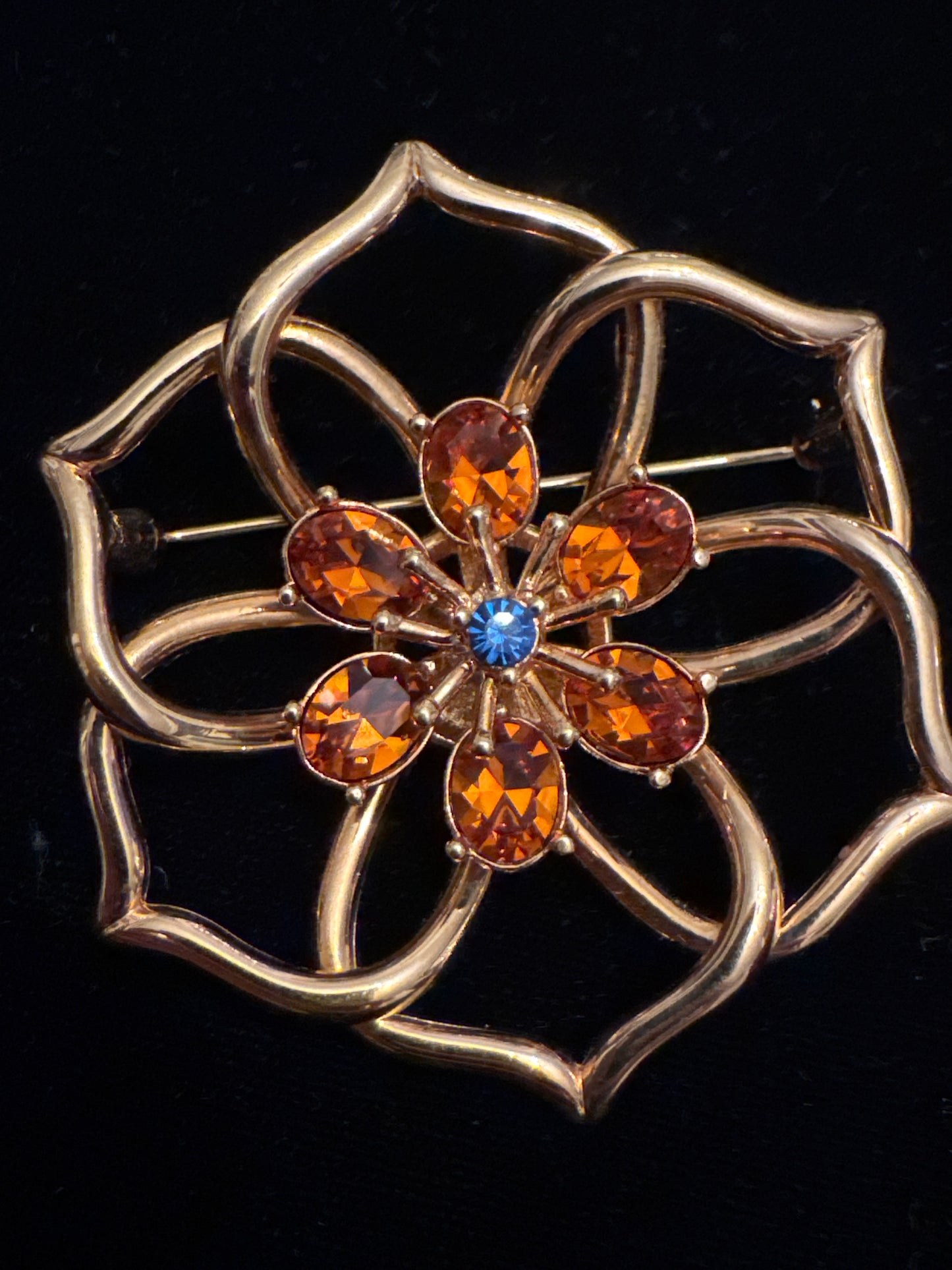 Vintage Weingeroff gold tone flower brooch/pendant with orange and blue glass rhinestones