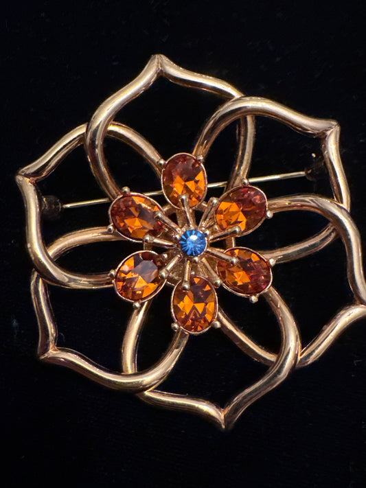 Vintage Weingeroff gold tone flower brooch/pendant with orange and blue glass rhinestones