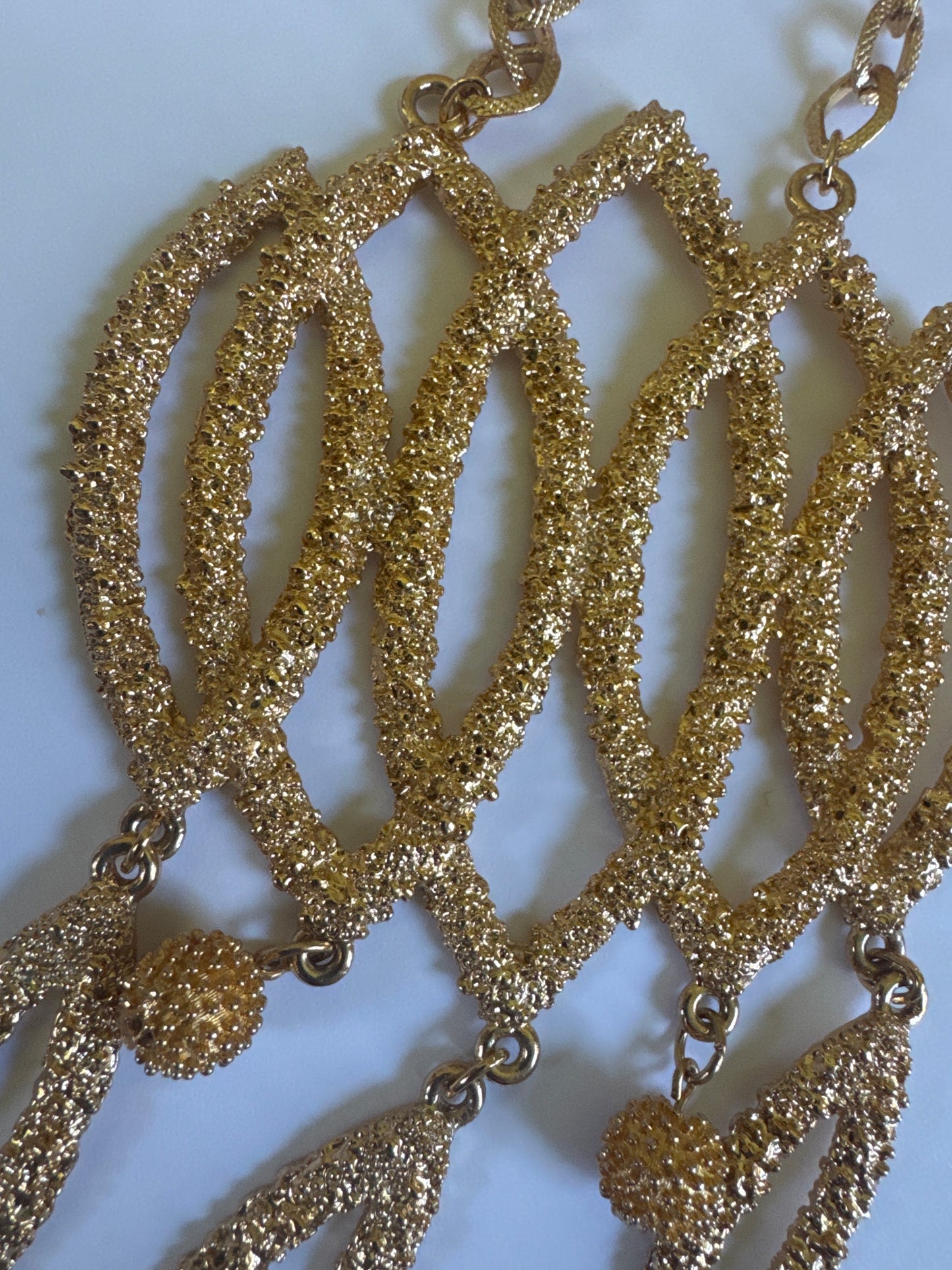 Fabulous large vintage 1971 NAPIER by Francis Fujio champagne bubbles necklace. Heavily gold plated metal with raised textured metal surface referred to as champagne bubbles. Large statement book piece