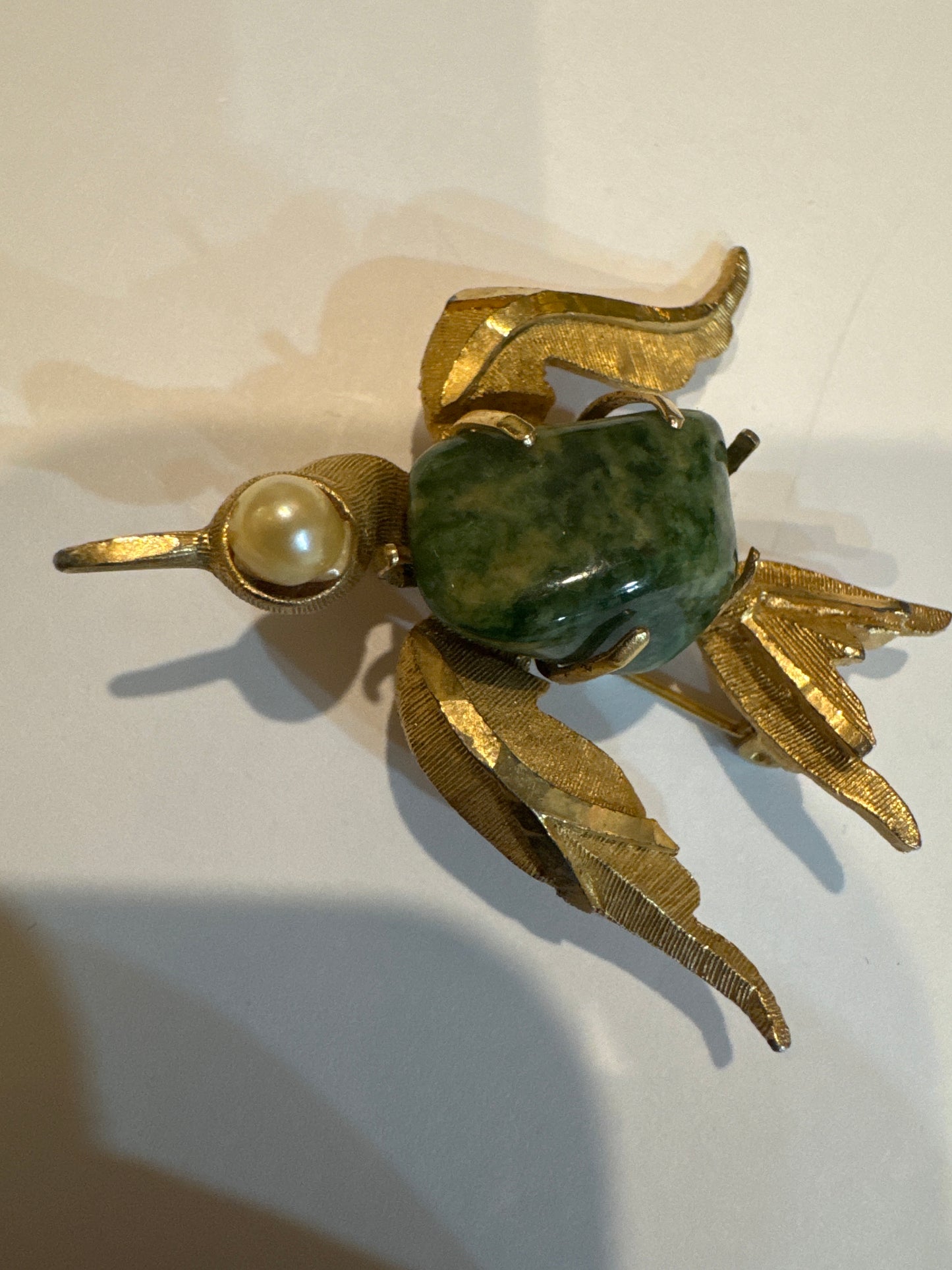 1950s signed BSK gold tone, bird brooch with pearl eye and green stone body