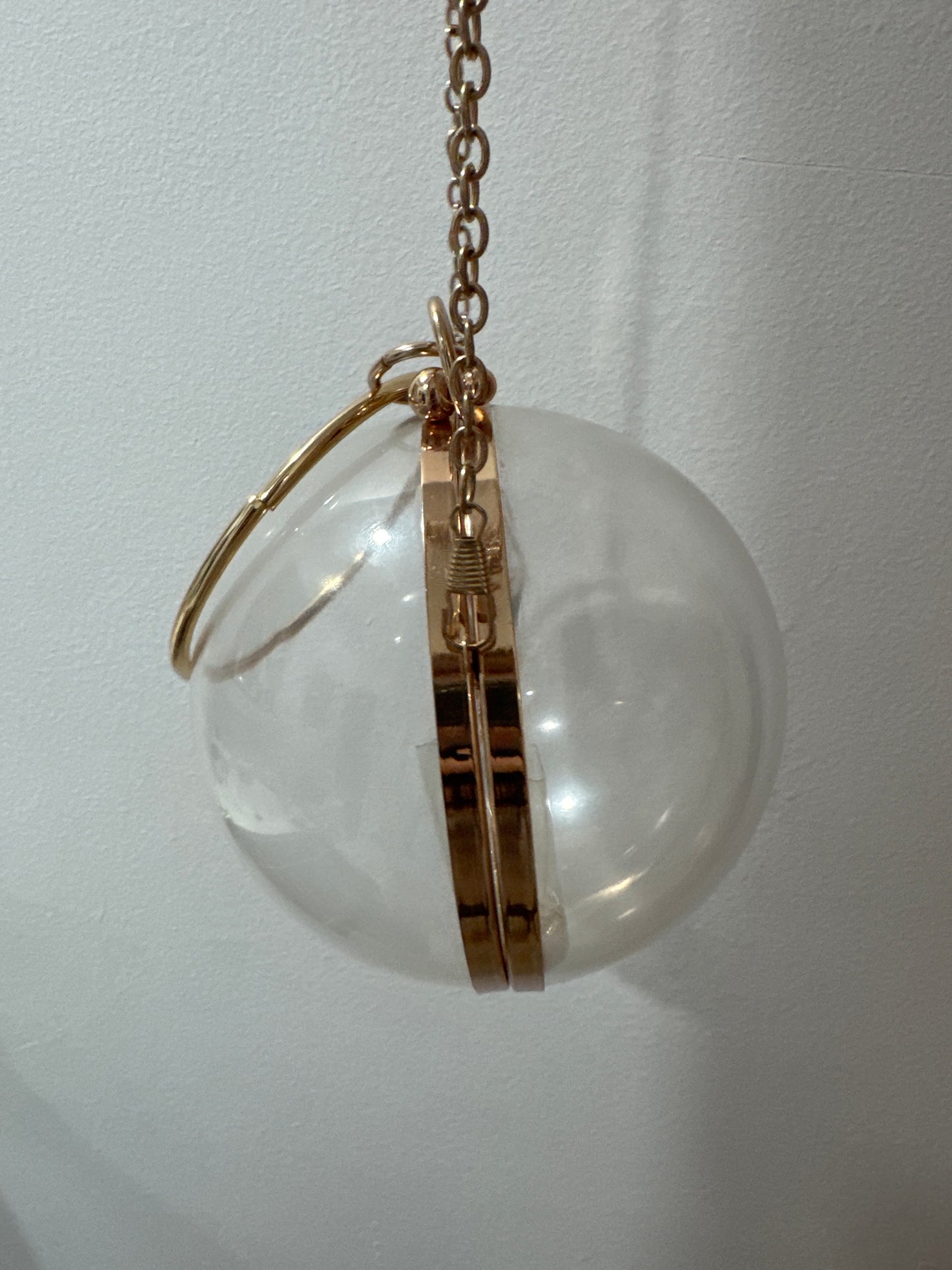 Fun 1980s mod bracelet/crossbody lucite bag with gold tone trim. crossbody strap is removable.