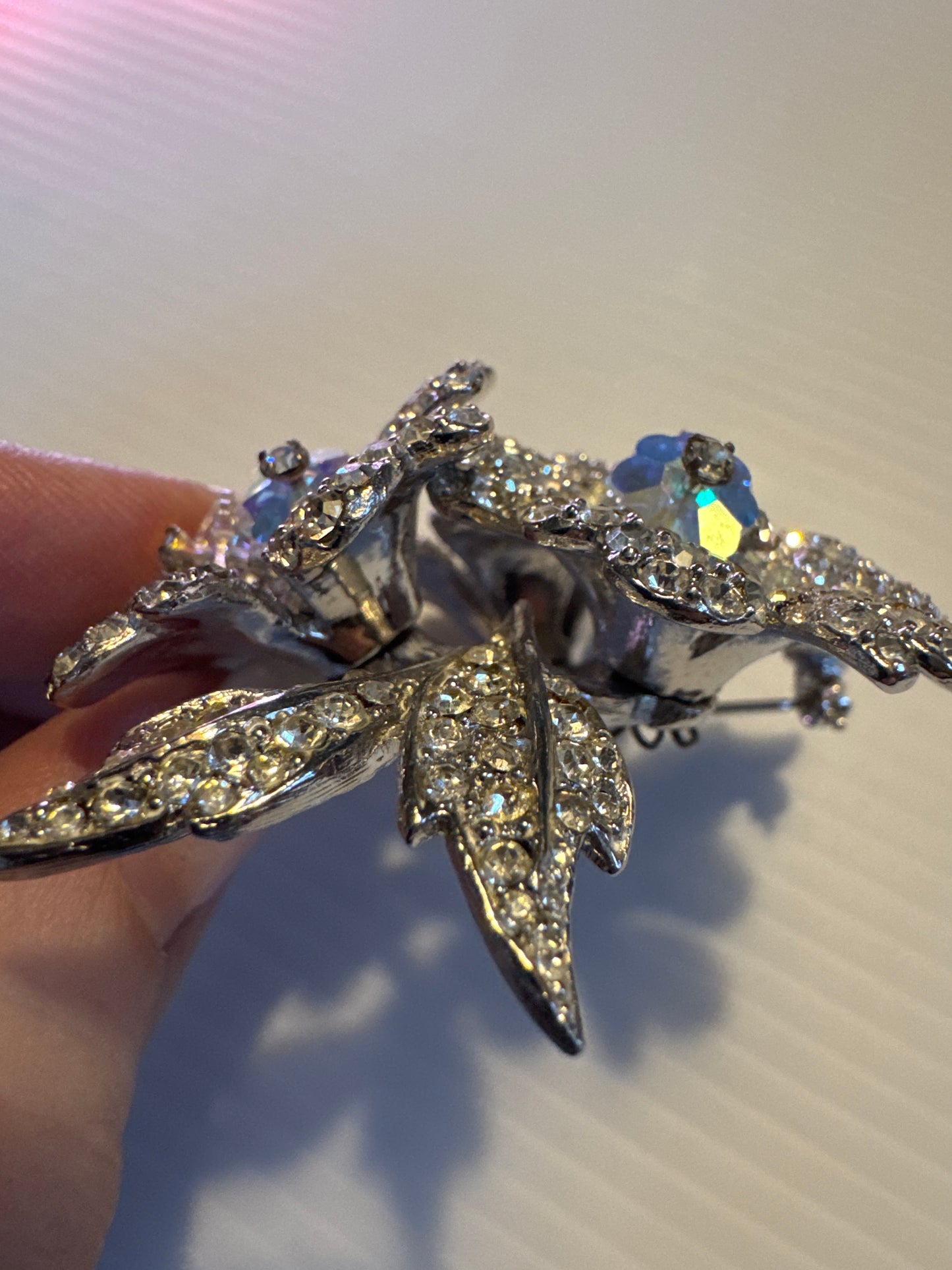 Beautiful 1960s sparkling 3D rhinestone flower brooch with dangle center stones