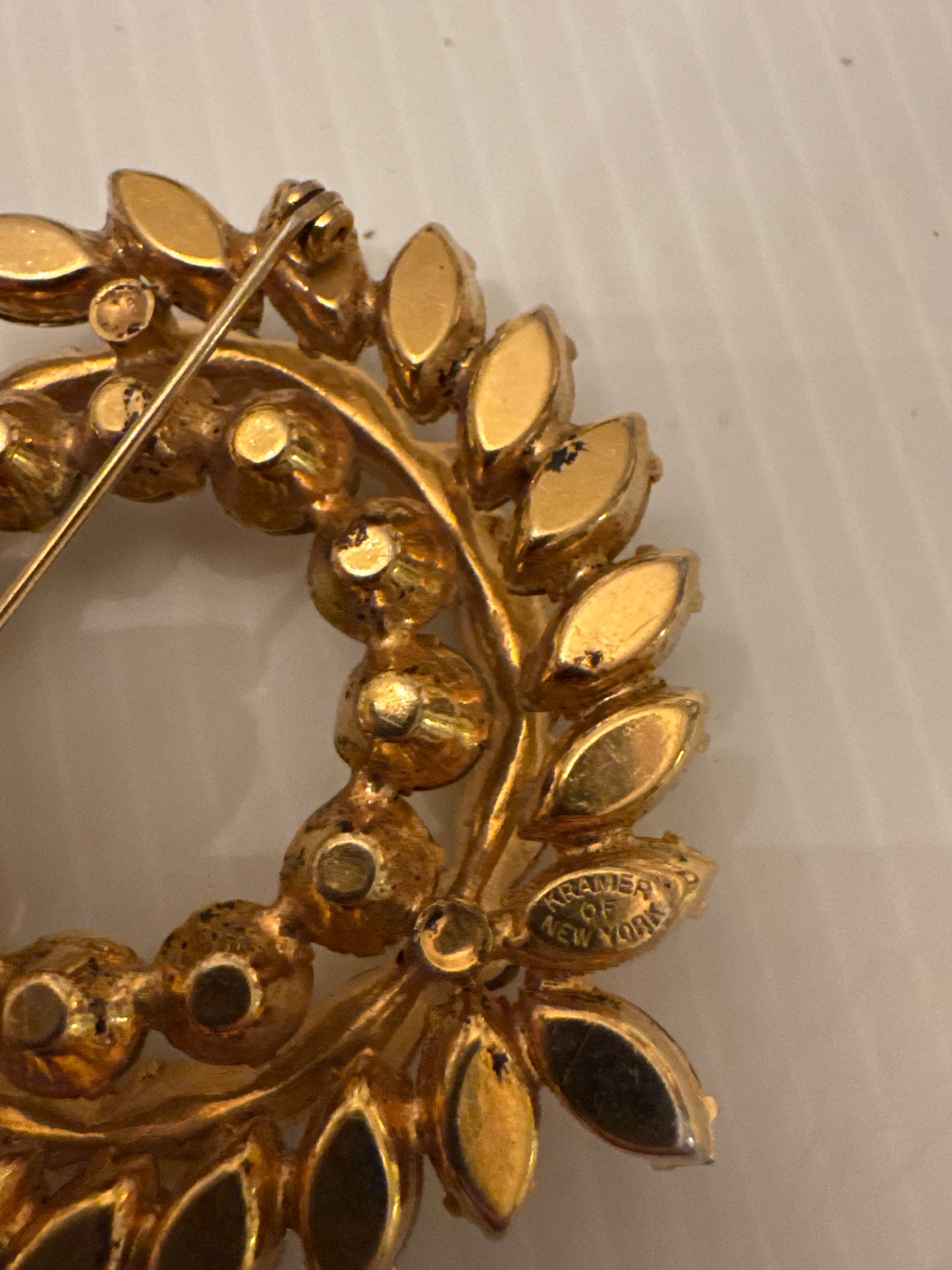 Signed KRAMER of New York 1950s dimensional wreath bow with amber colored and light champagne colored glass stones