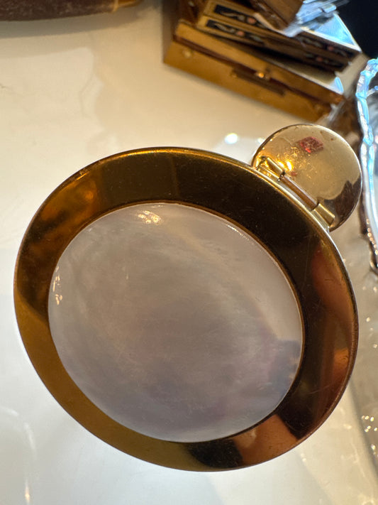 vintage refillable lipstick holder with mirror. Folds up.