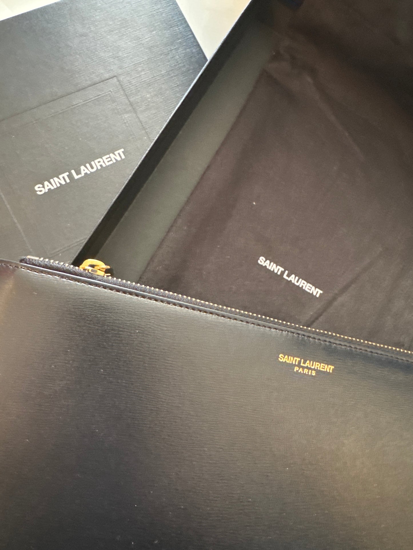 Saint Laurent, Paris, black leather envelope clutch with zip top, original box and dust bag