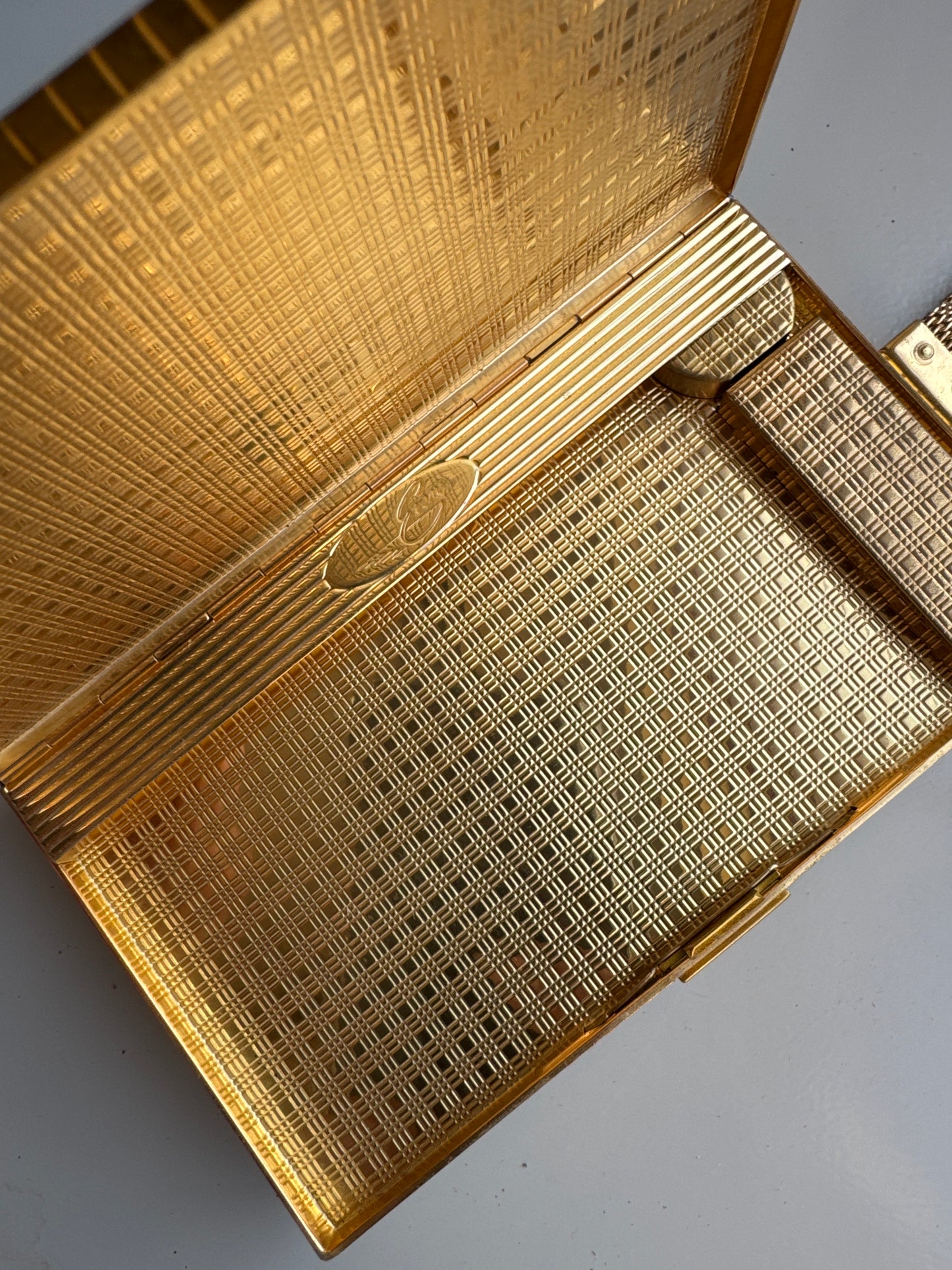 Beautiful gold tone, 1930s double-sided MINAUDIERE. One side, Makeup one side cigarettes. Beautiful rhinestone detailing on the outside. Signed Evans.Tom