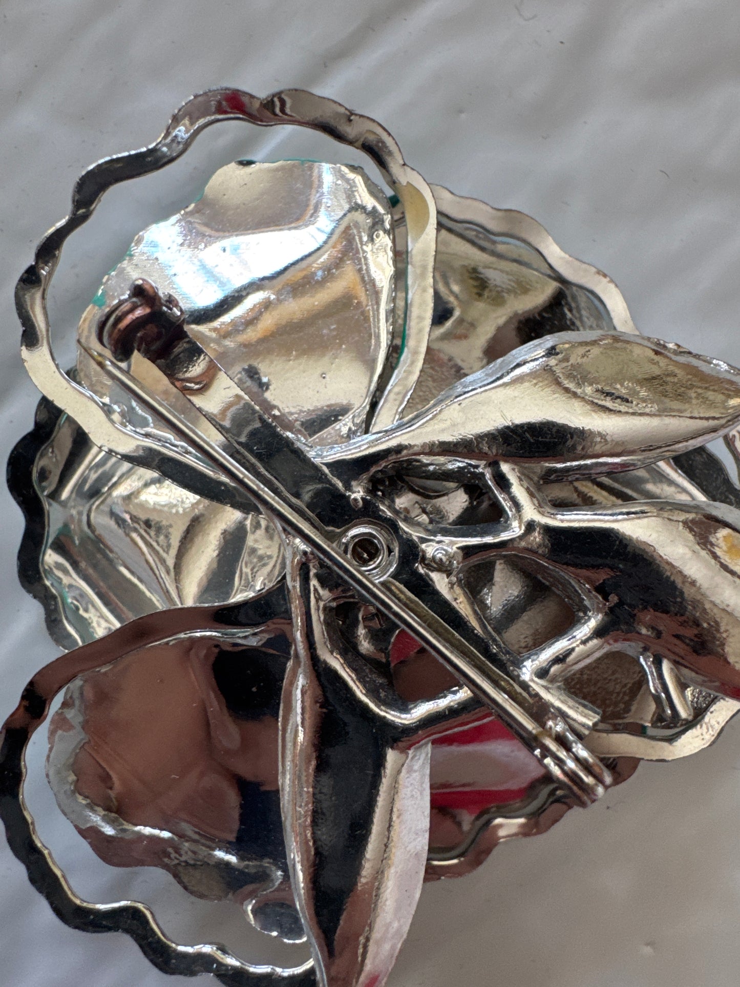 1970s turquoise flower brooch with center aurora borealis