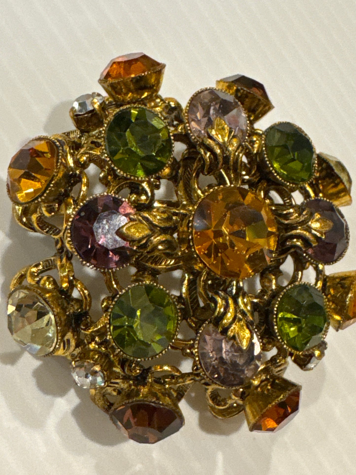 Beautiful jewel, toned rhinestone glass brooch made in West Germany