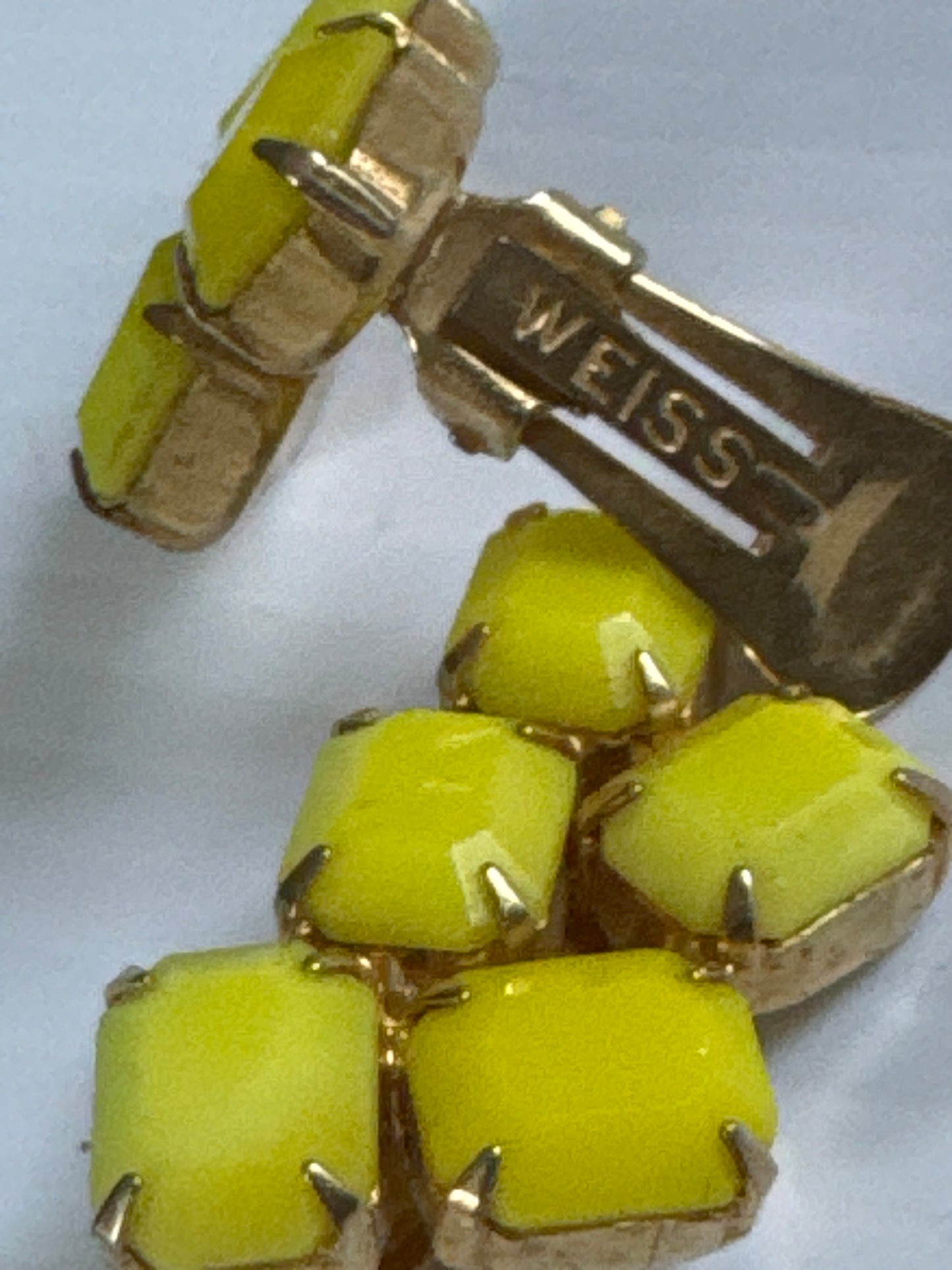 1960s yellow clip on signed WEISS earrings