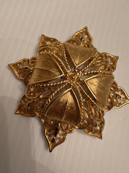 1970s open dome MONET gold tone brooch