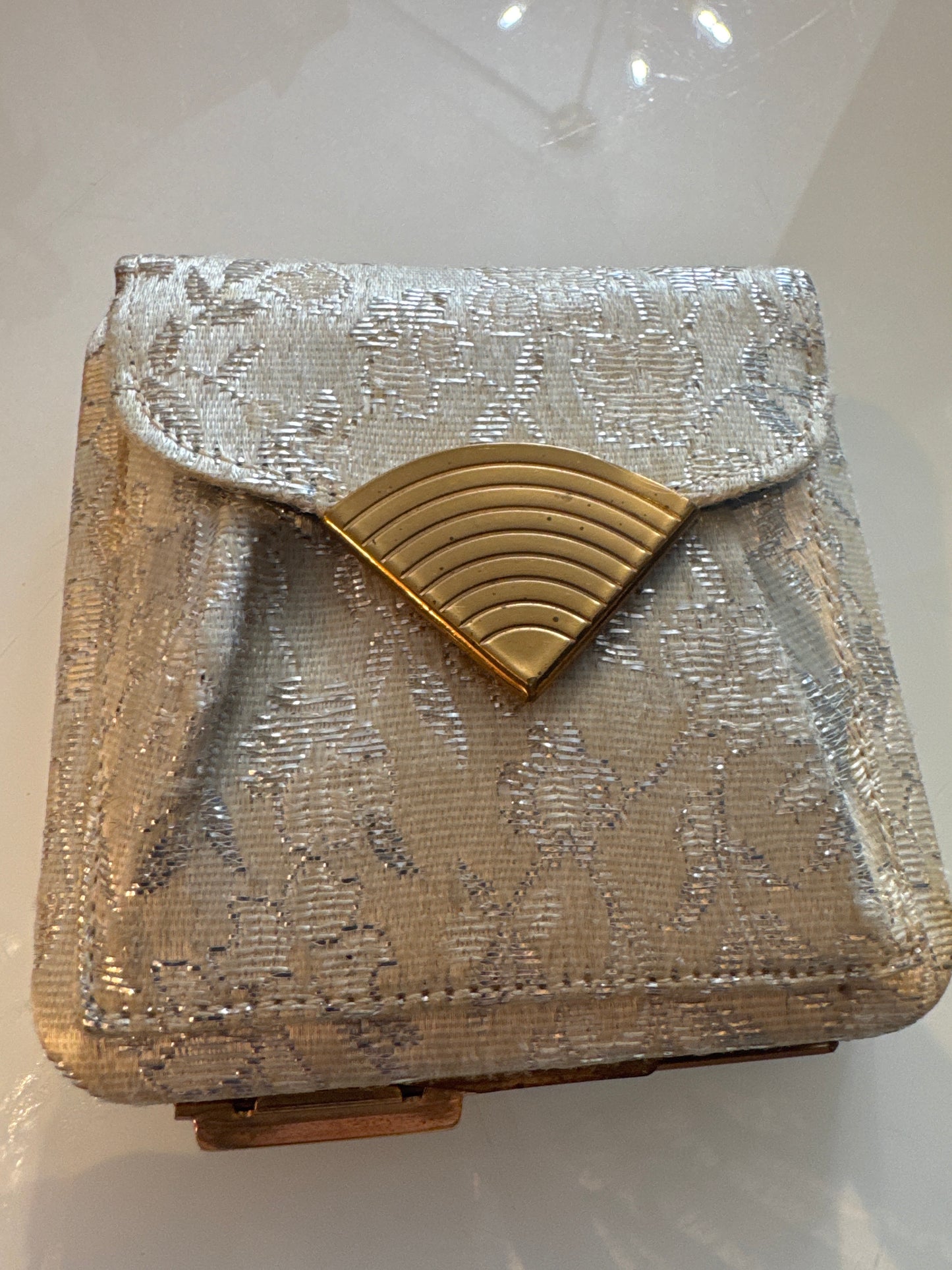 Beautiful brocade, Makeup, compact and coin purse with slide lock. Designed  in the 1950s by LIN BREN.
