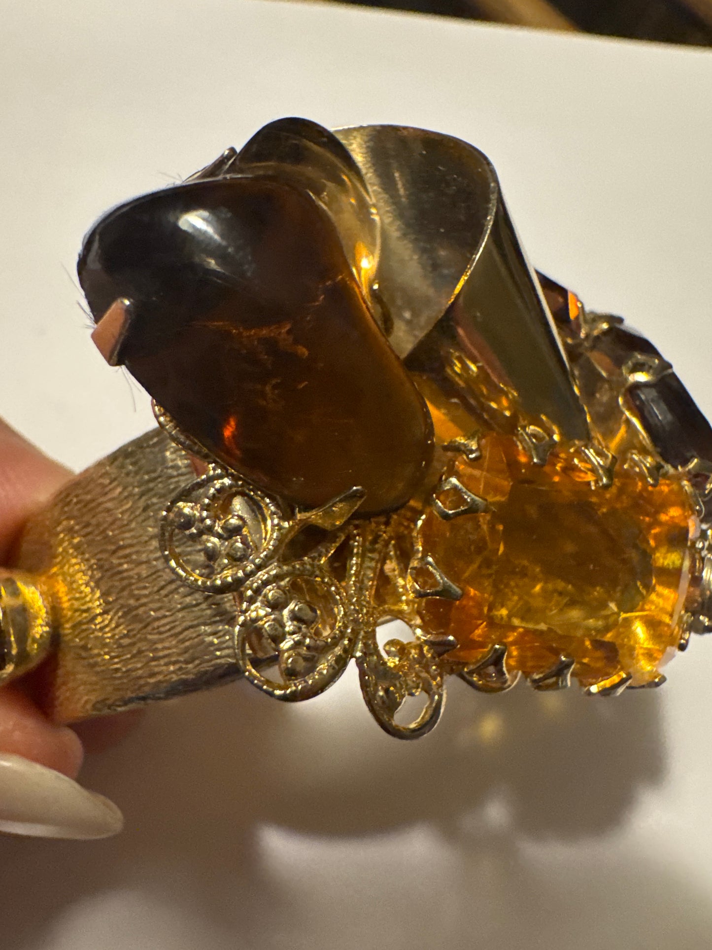 Beautiful 1950s rushed gold clamper cuff bracelet with topaz and Amber colored rhinestones