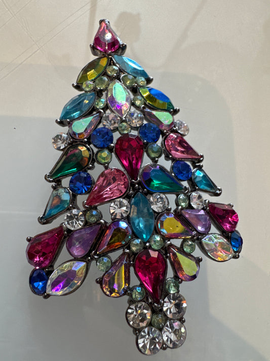 The famous 1980s AVON tree rhinestone brooch
