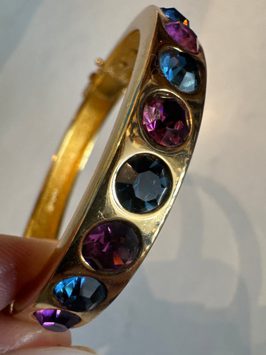 Beautiful 1990s vintage Dior clamper bracelet with blue and purple rhinestones and safety latch
