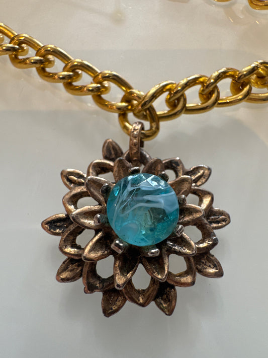 vintage gold tone, charm bracelet with flower charm and aqua colored stone