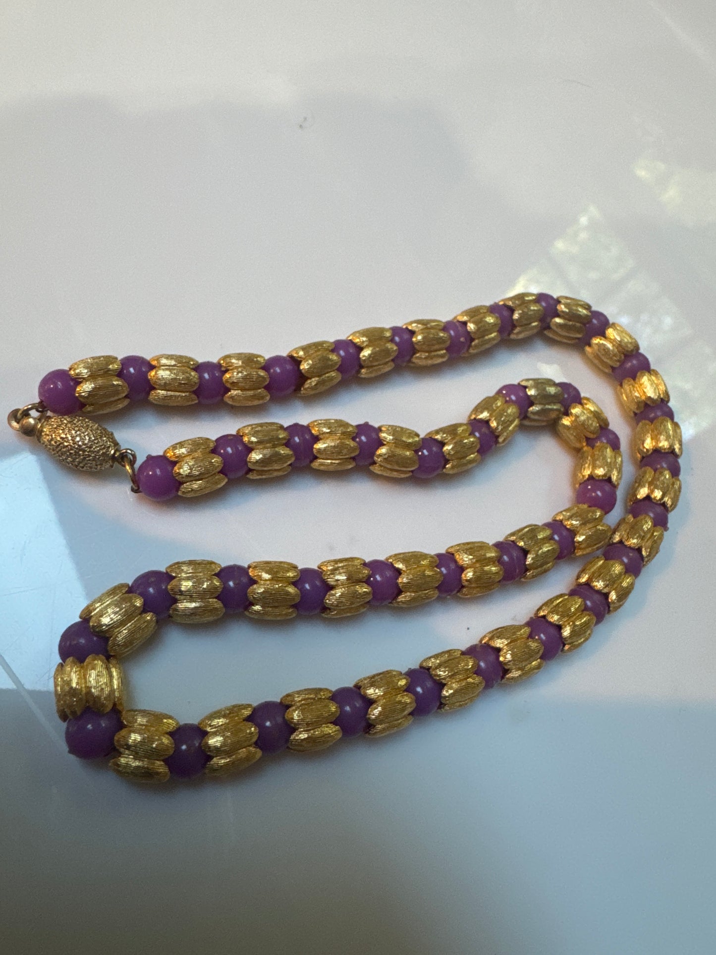 Beautiful gold tone and purple bead choker necklace