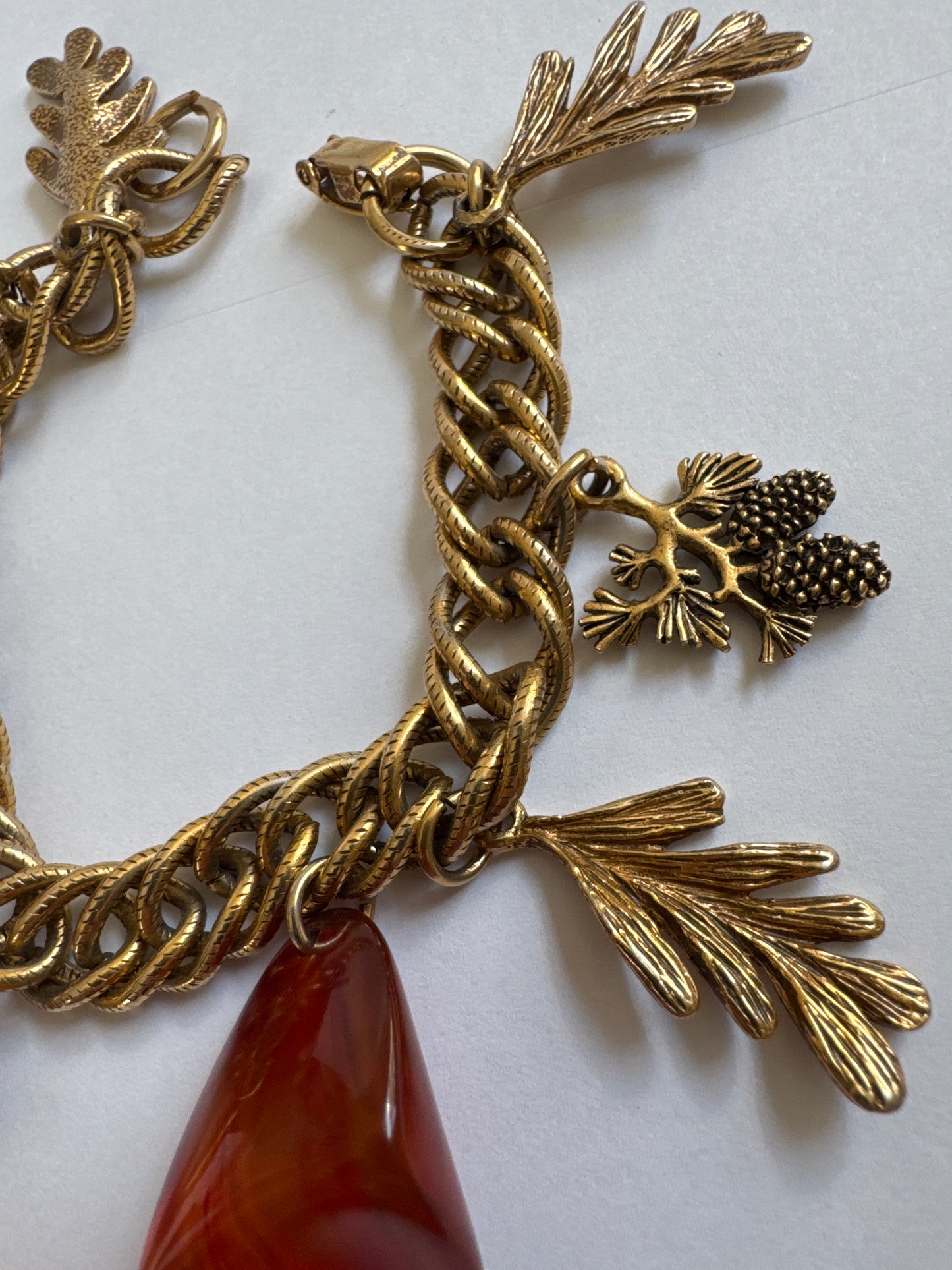 1970s tortoise resin shapes with pinecones and leaves on a charm bracelet