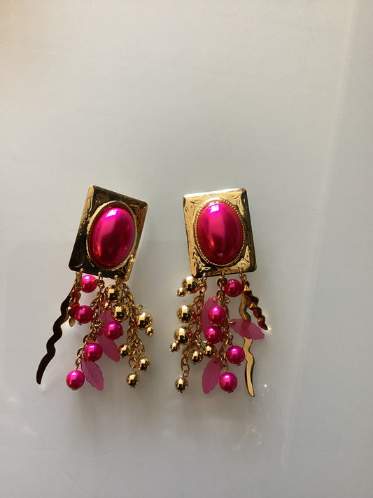 Pink and gold dangle clip earrings from 1990s