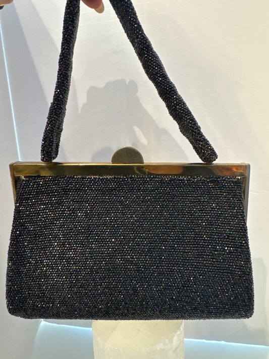 Beautiful 1940s black beaded top handle bag in mint condition with original mirror