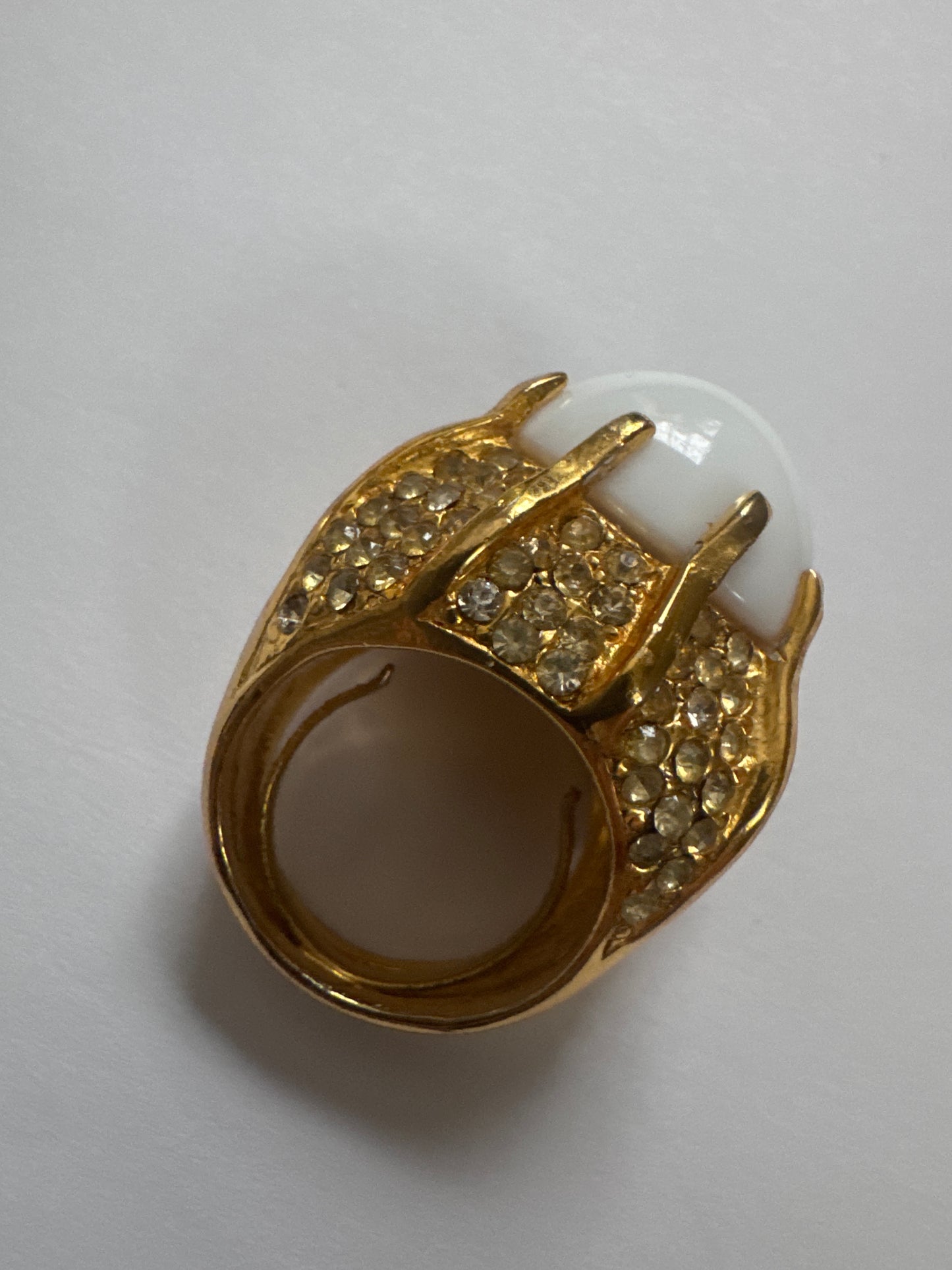 1980s signed Kenneth Lane cocktail ring with white cabochon and rhinestones