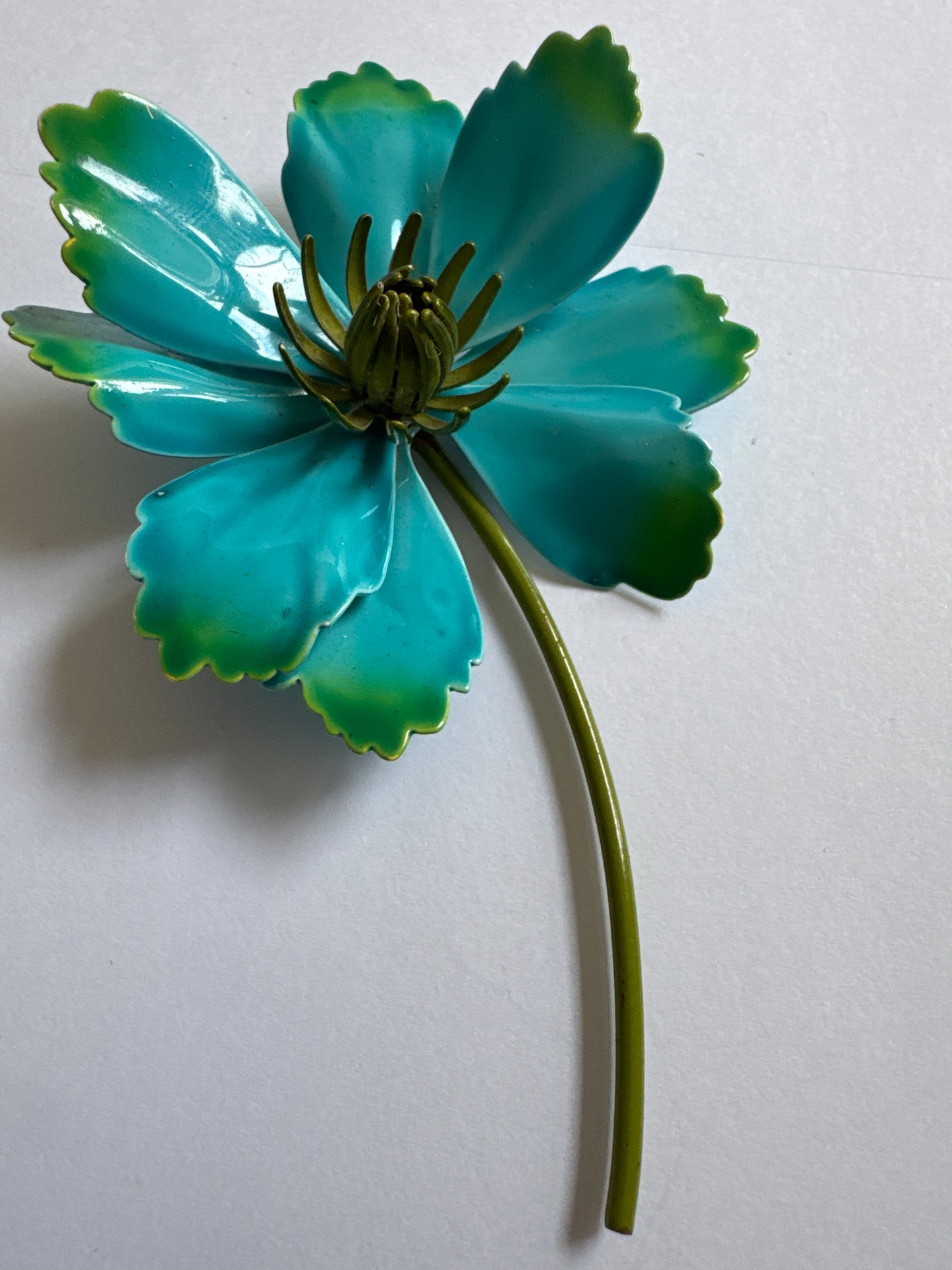 1960s tin flower cut out brooch in gorgeous, turquoise, and green