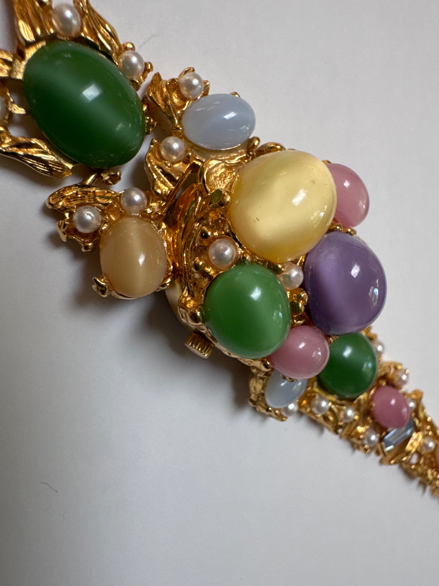 Vintage 1970s pastel cabachon bracelet. But guess what there's a secret watch. Does it work? That is the question ❤️