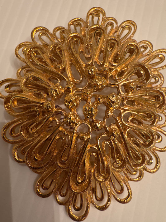Jumbo gold tone Monet Palazzo book piece brooch