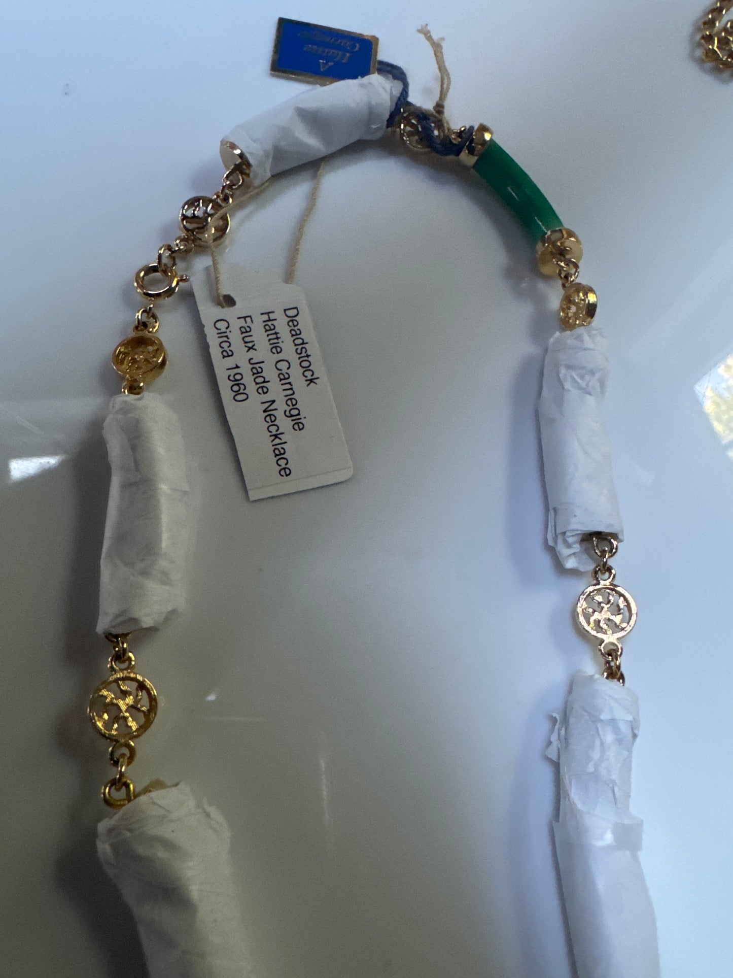 Beautiful vintage HATTIE CARNEGIE faux jade necklace circa 1960. Comes with original tag and is still wrapped. Ready to ship.