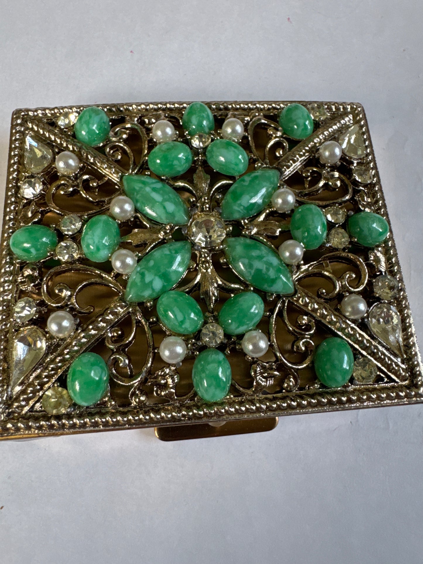 vintage 1950s jade cabachon in rhinestone topped case with mirror