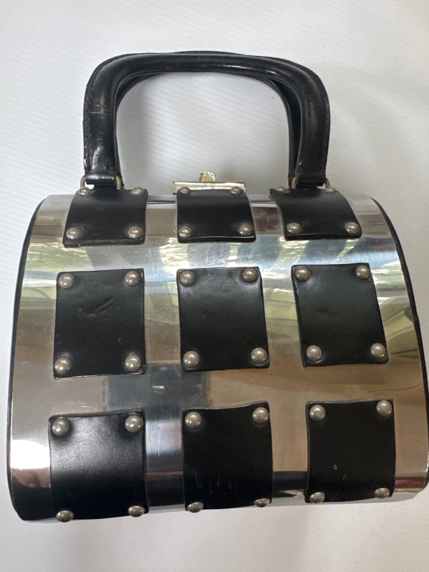 Beautiful 1960s silver, metal and leather top handle bag