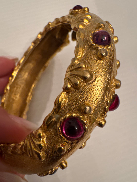Beautiful vintage signed YOSCA clamper bracelet from 1980s with red pink and purple rhinestones