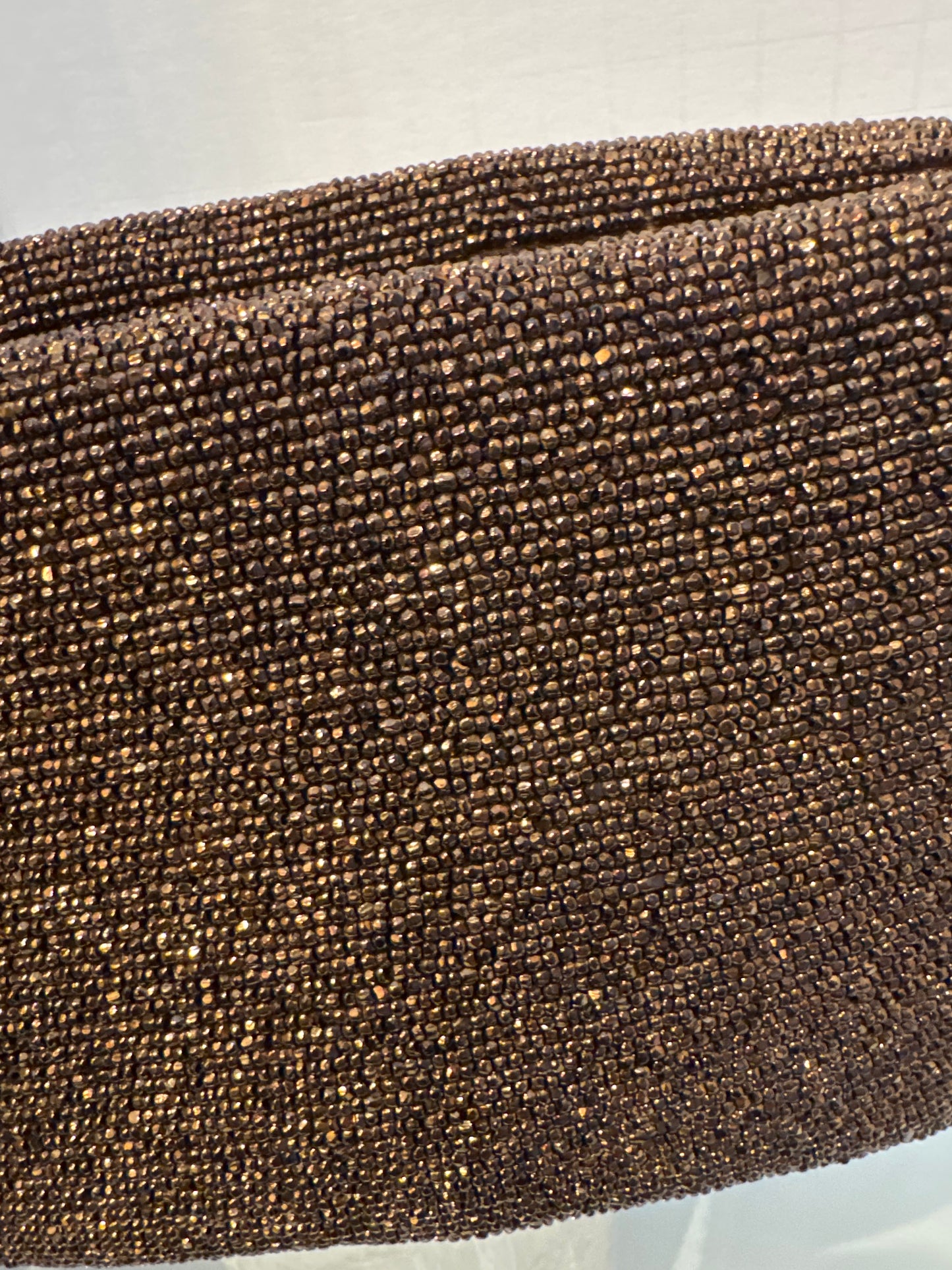 Show stopping bronze beaded clutch from the 1940s with zipper. Mint condition.