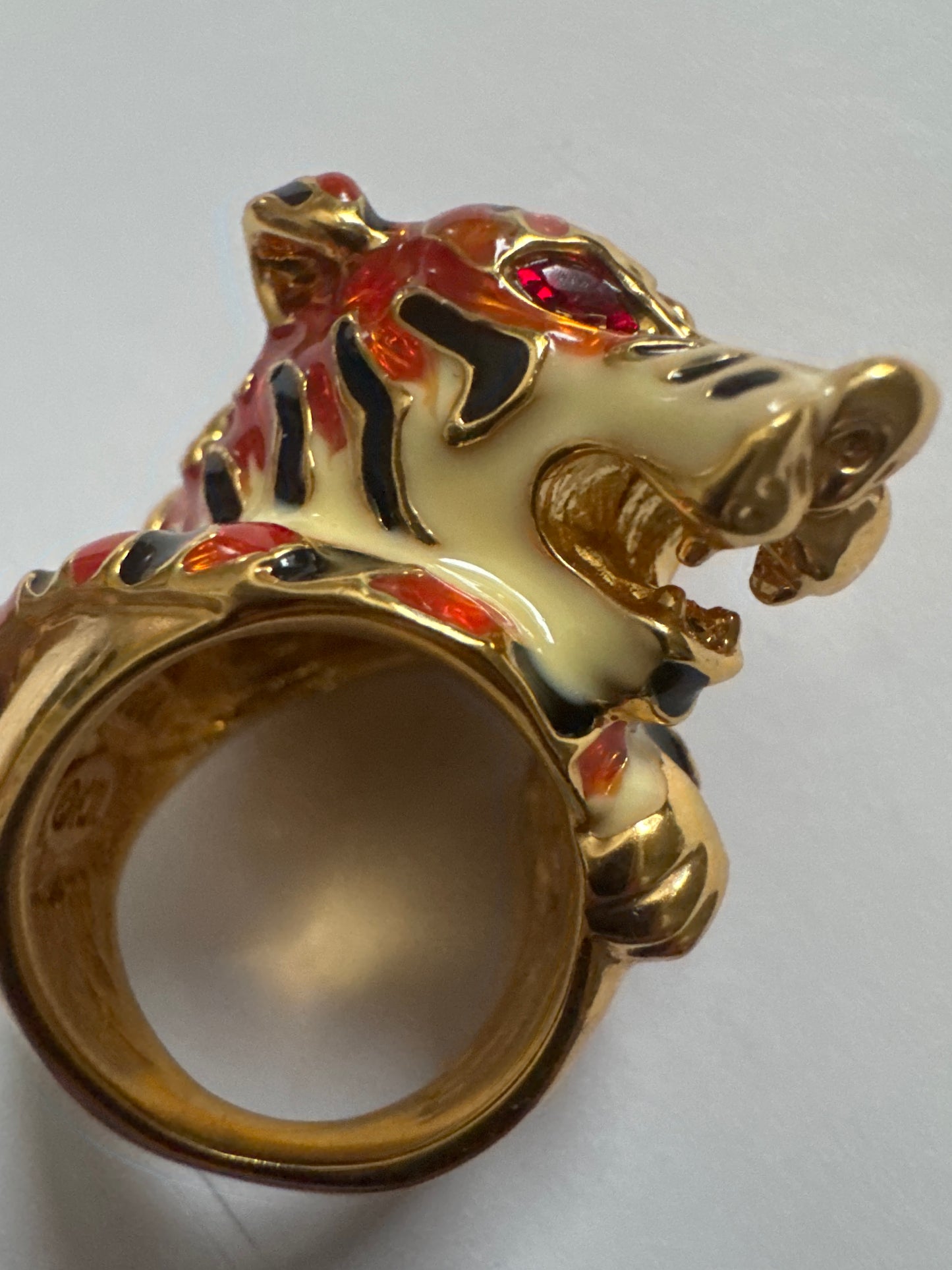 1990s enamel tiger ring with rhinestone eyes. signed KJL China.