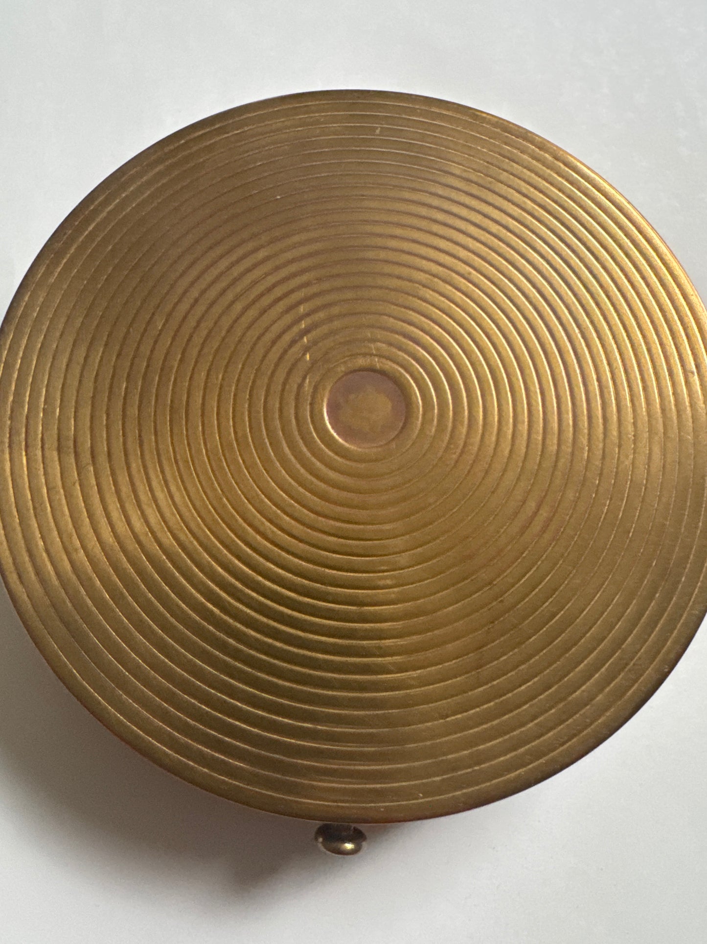 1935 Schiaparelli/Salvador Dali collab oversized powder makeup compact. Customers had the option of having the piece engraved. Featured in the book Schiaparelli and the Artists pg 65. Produced in very limited quantities and are unsigned.