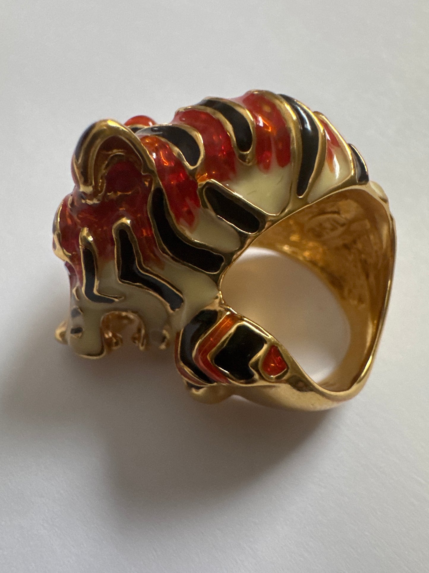 1990s enamel tiger ring with rhinestone eyes. signed KJL China.