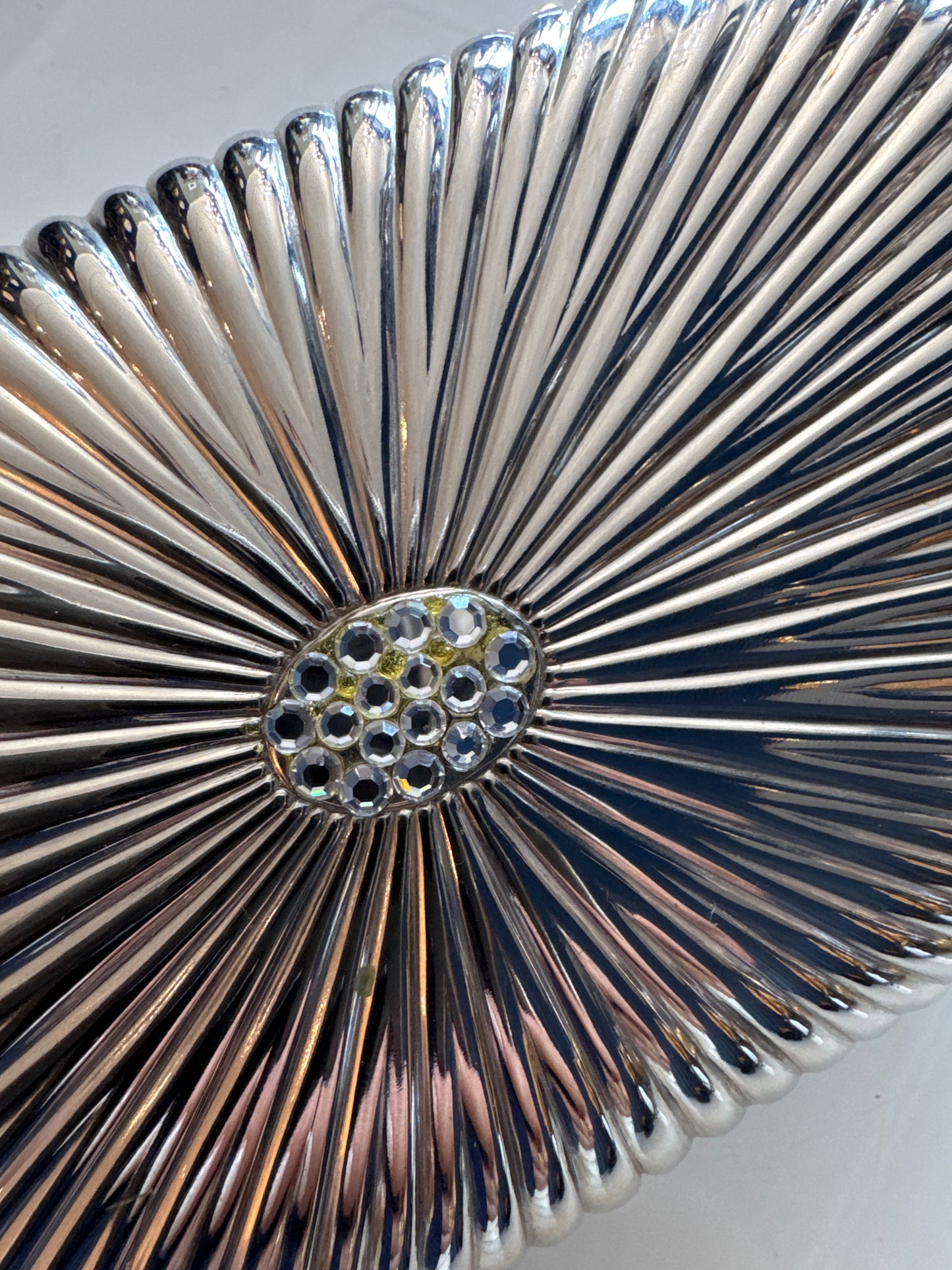 Stunning 1940s Walborg silver hardtop clutch with optional chain. Clear rhinestones in center - black on push top
