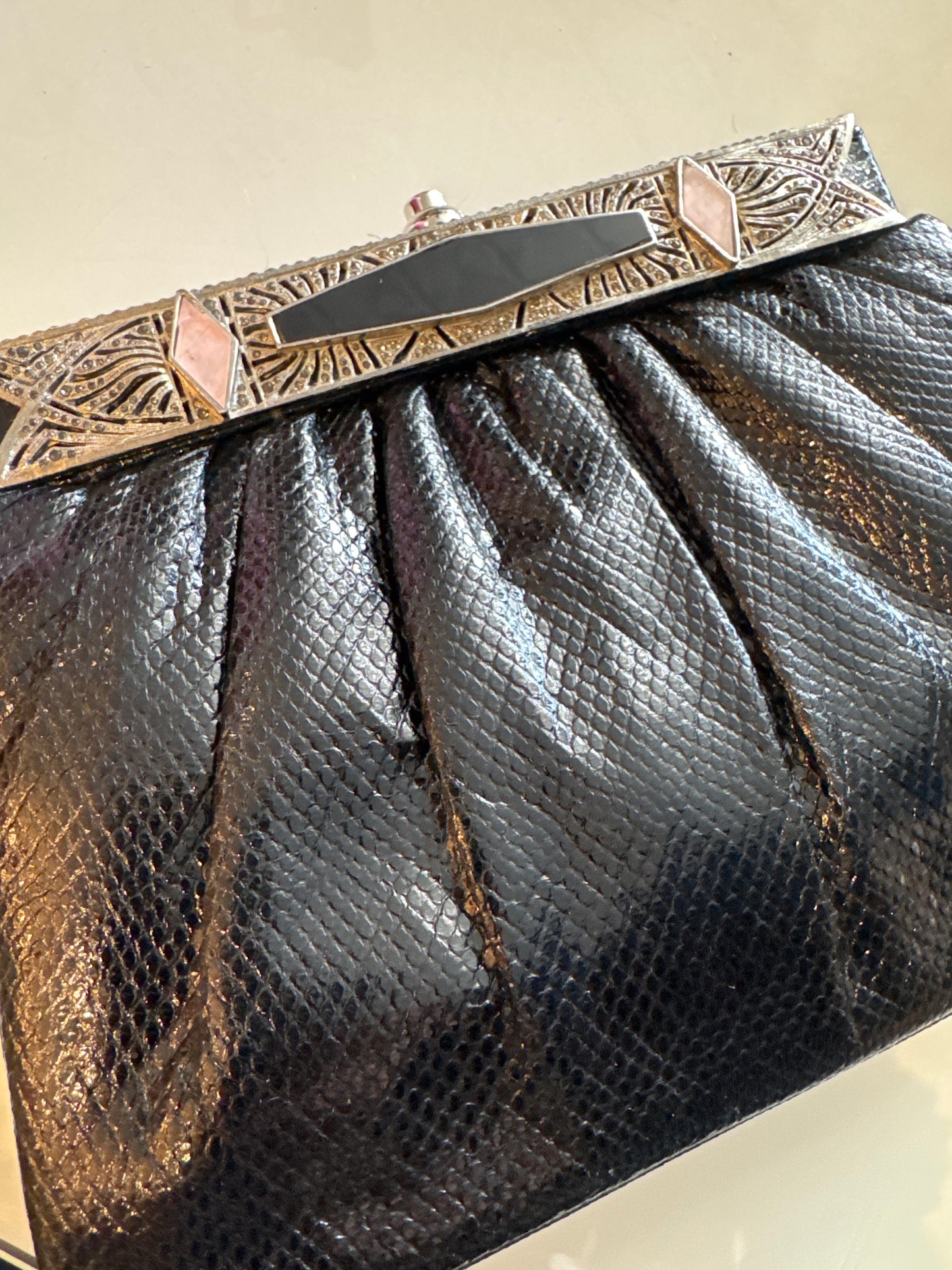 1980s gorgeous Black Judith Lieber with Art Deco, inspired and crusted jewels, including black and pink enamel and rhinestone detail. Silver attached shoulder chain.