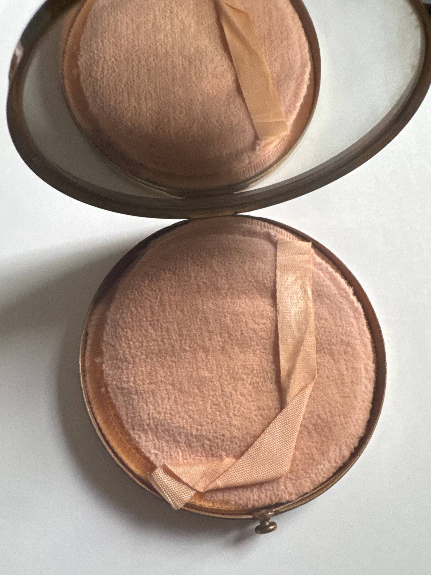 1935 Schiaparelli/Salvador Dali collab oversized powder makeup compact. Customers had the option of having the piece engraved. Featured in the book Schiaparelli and the Artists pg 65. Produced in very limited quantities and are unsigned.
