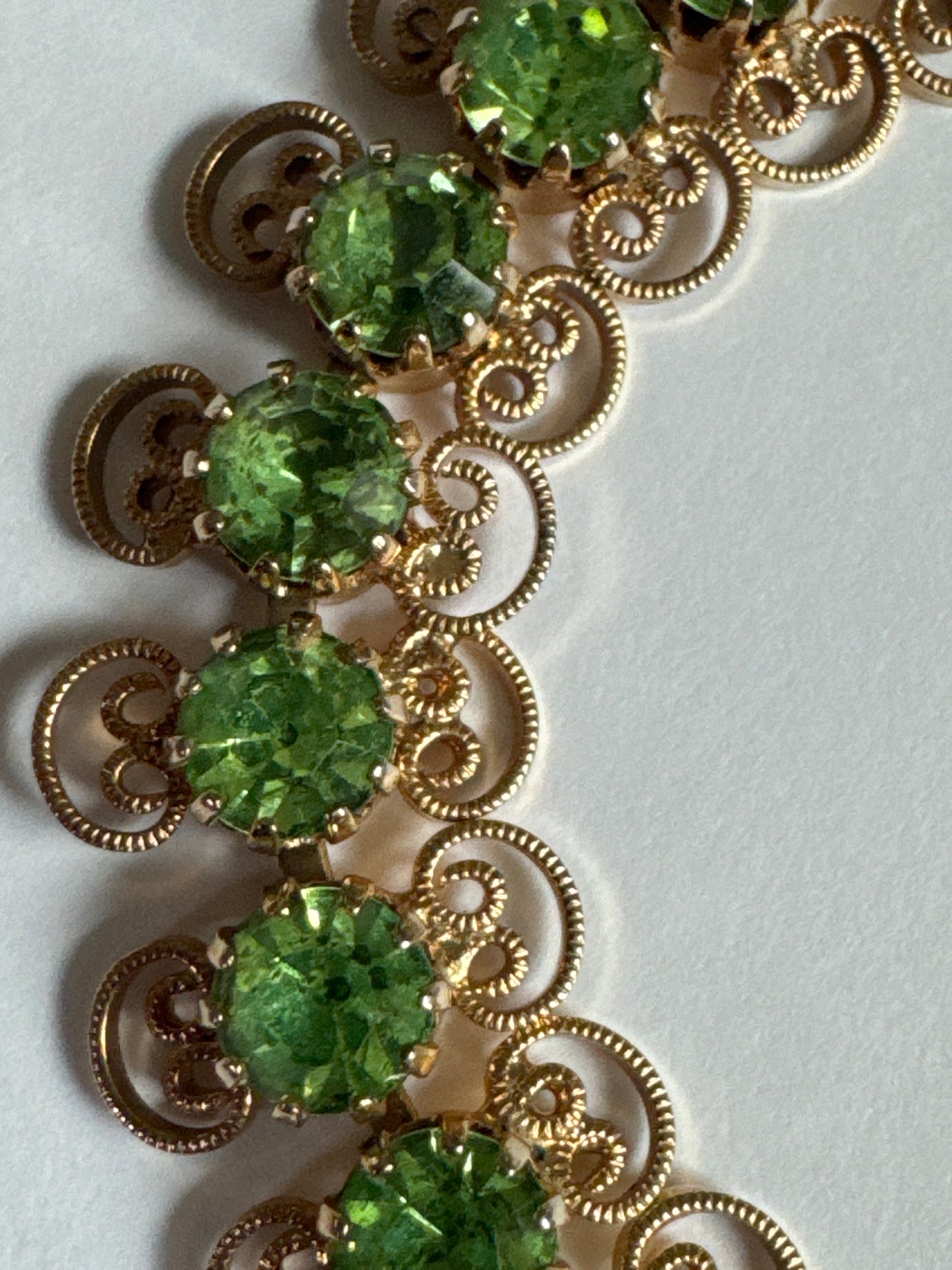 1960s delicate light green rhinestone with gold tone, filigree bracelet