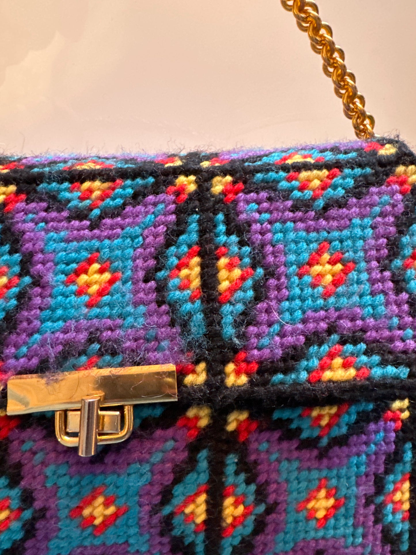 1970s handcrafted multicolored bag with gold tone handle