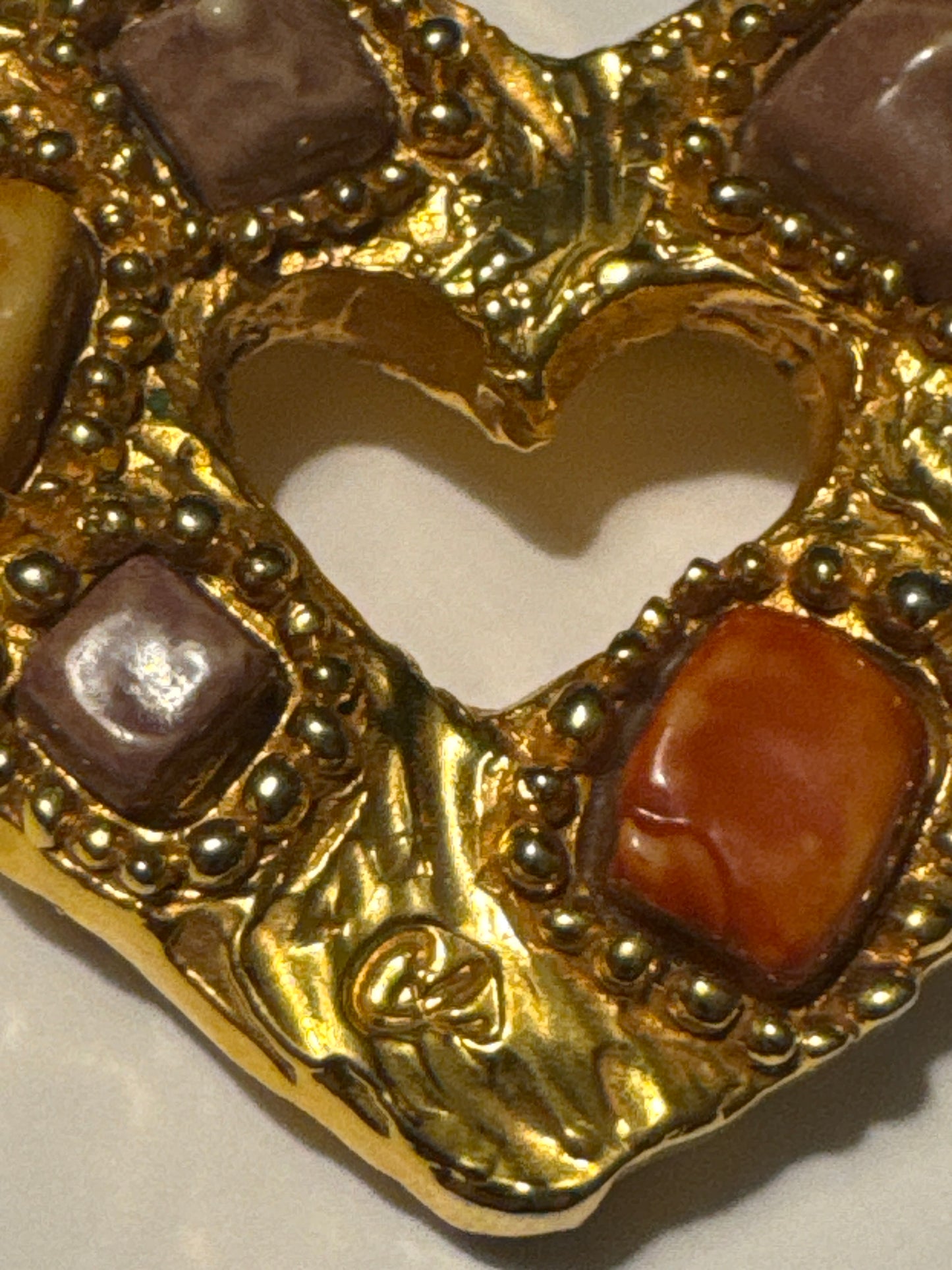 1980s signed Christian Lacroix heavy hammered gold plate brooch with glass cabochons